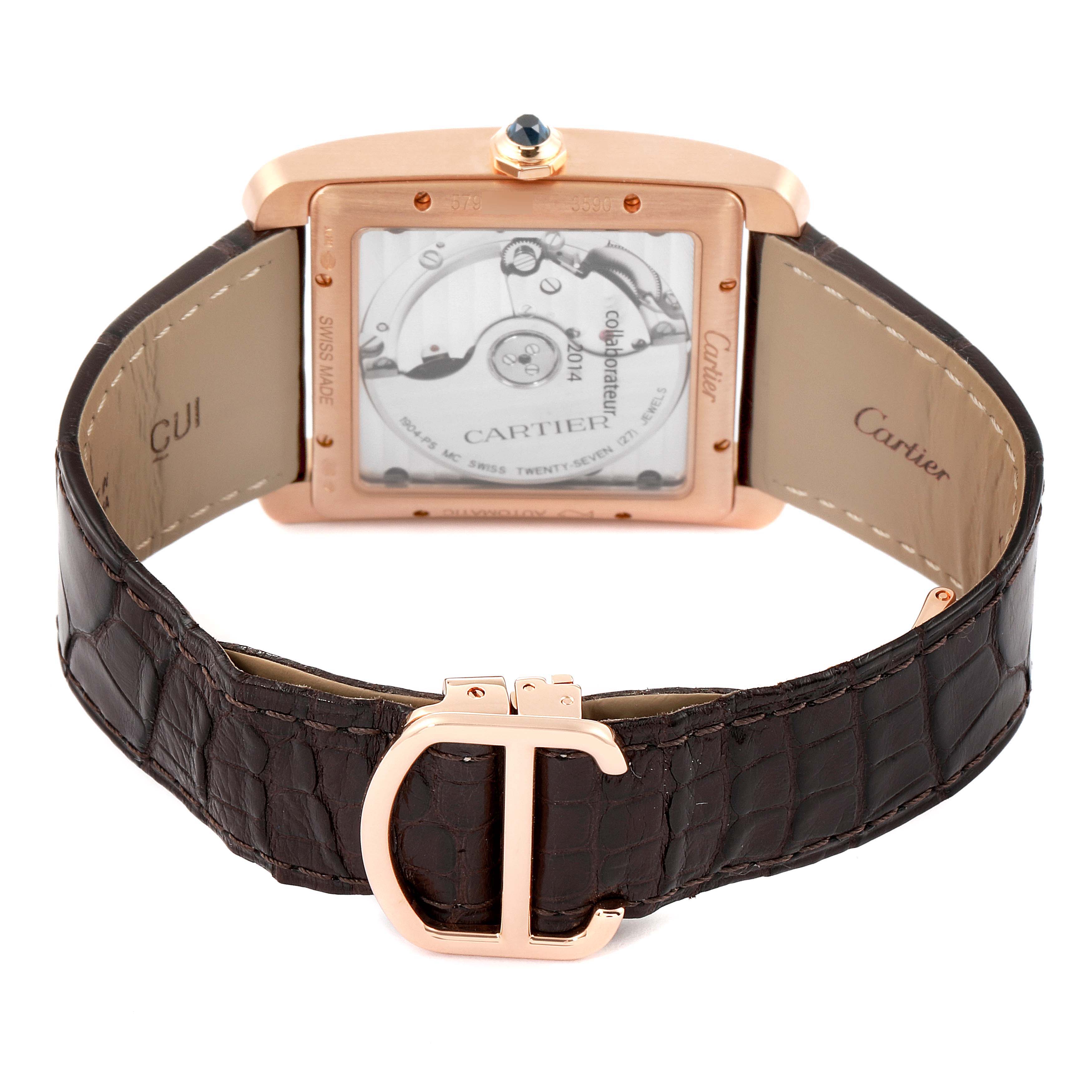 The Cartier Tank MC W5330001 Men's Rose Gold Silver Dial W5330001 Men's Rose Gold Silver Dial watch is shown from the rear, highlighting the movement and leather strap with the clasp open.