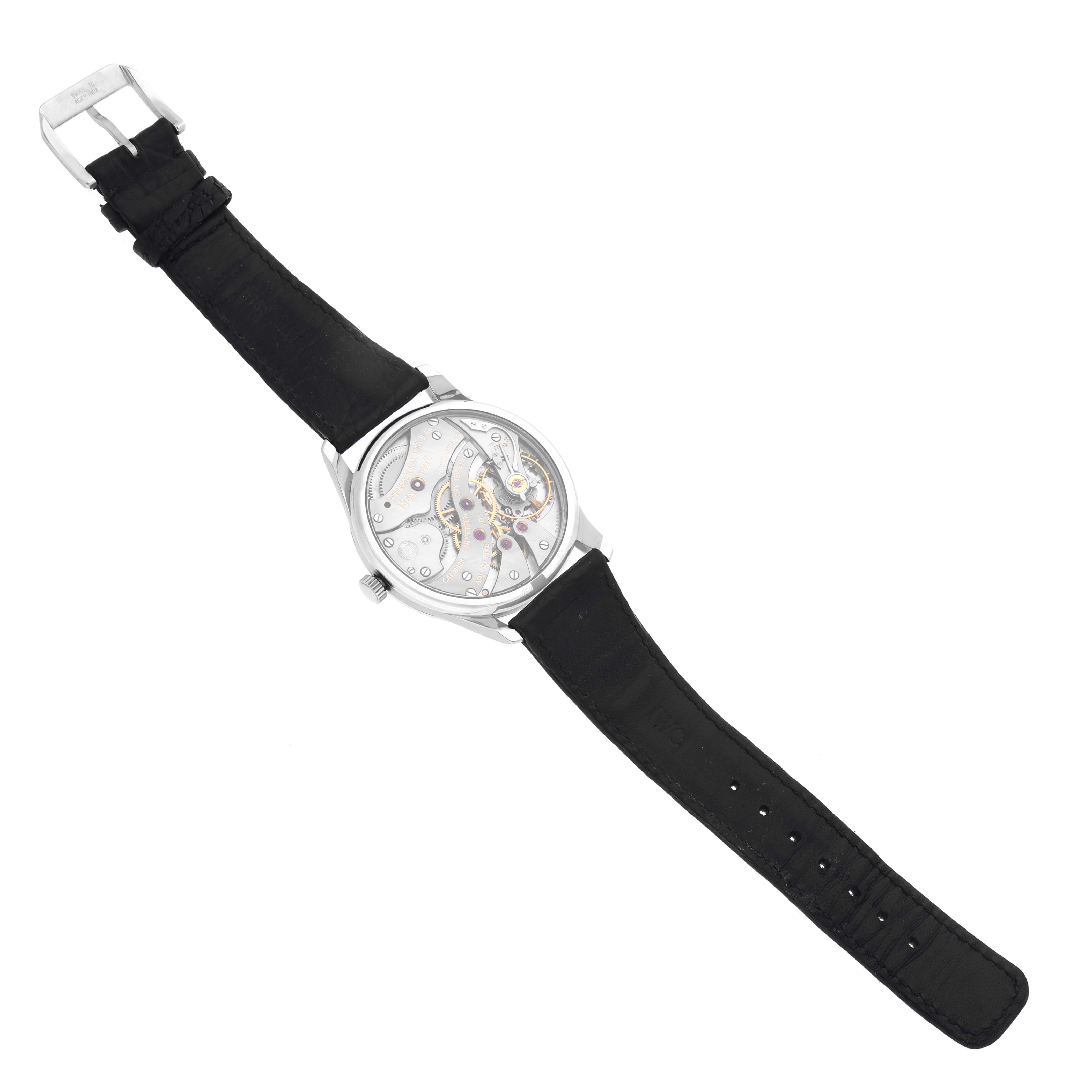 The IWC Portuguese IW5441 Men
s Stainless Steel Silver Dial IW5441 Men
s Stainless Steel Silver Dial watch is shown from a top view, displaying its back case and black leather strap.