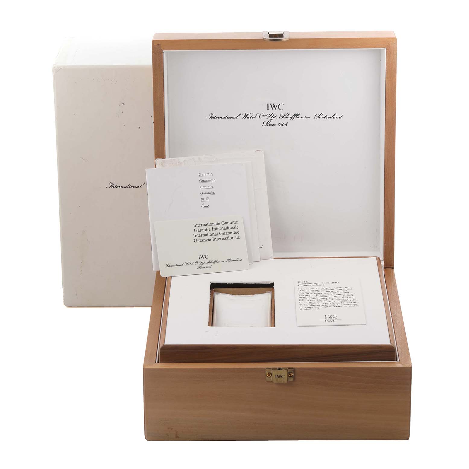 The image shows an IWC Portuguese IW5441 Men
s Stainless Steel Silver Dial IW5441 Men
s Stainless Steel Silver Dial watch box with guarantee cards and documentation inside.
