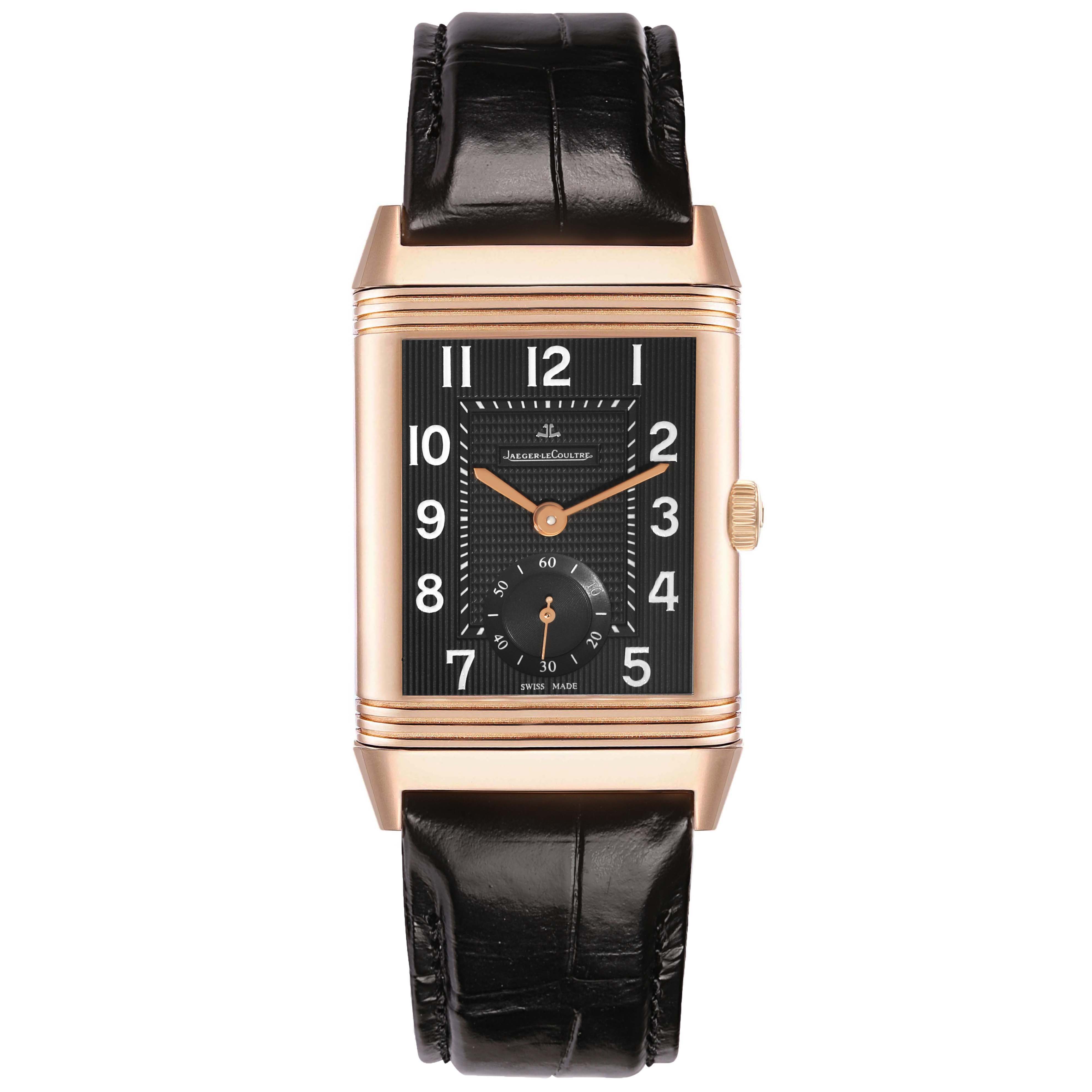 The Reverso by Jaeger-LeCoultre is shown from a front angle, displaying its dial, case, crown, and leather strap.
