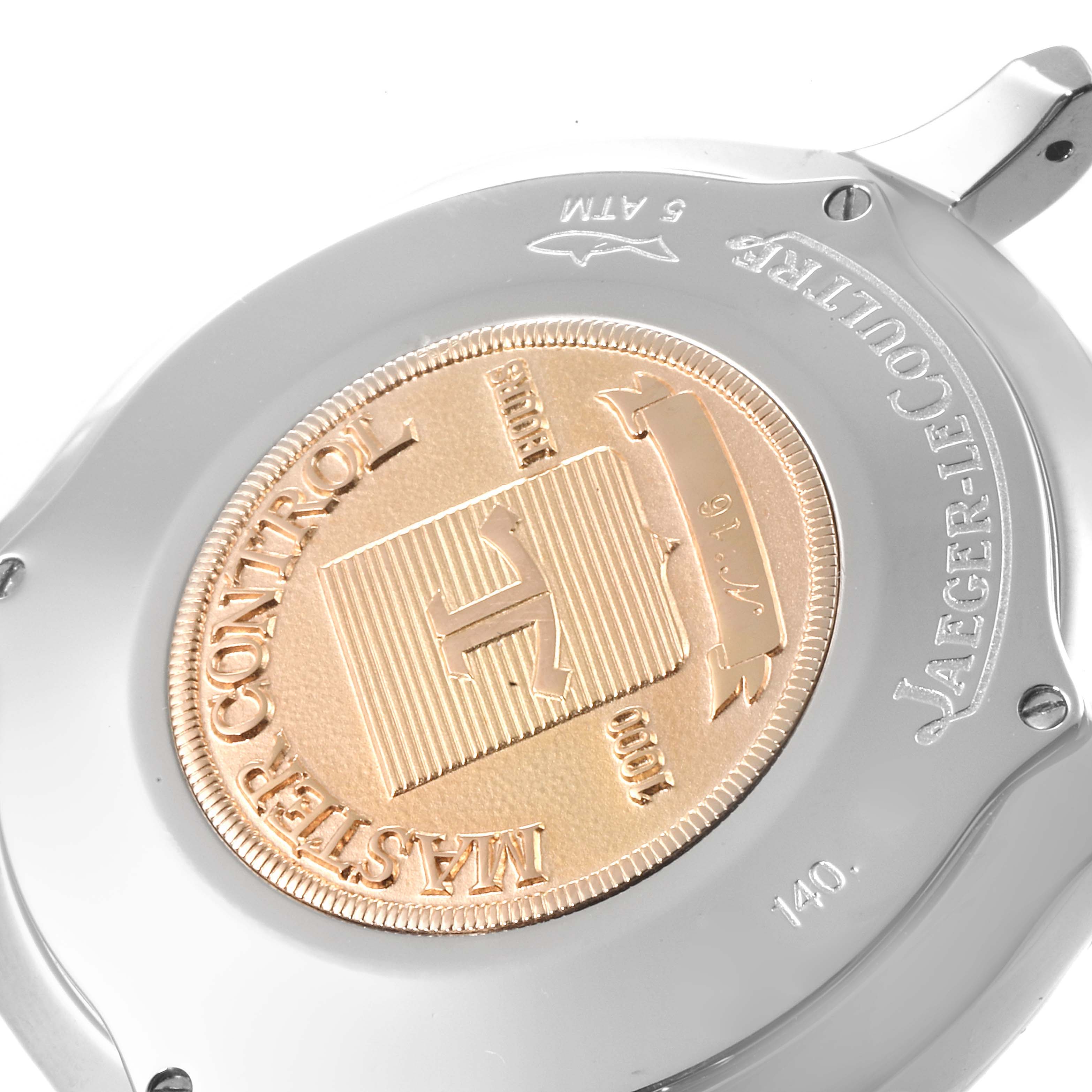 This image shows the back casing of a Jaeger-LeCoultre Master watch, featuring the brand's seal and inscriptions.