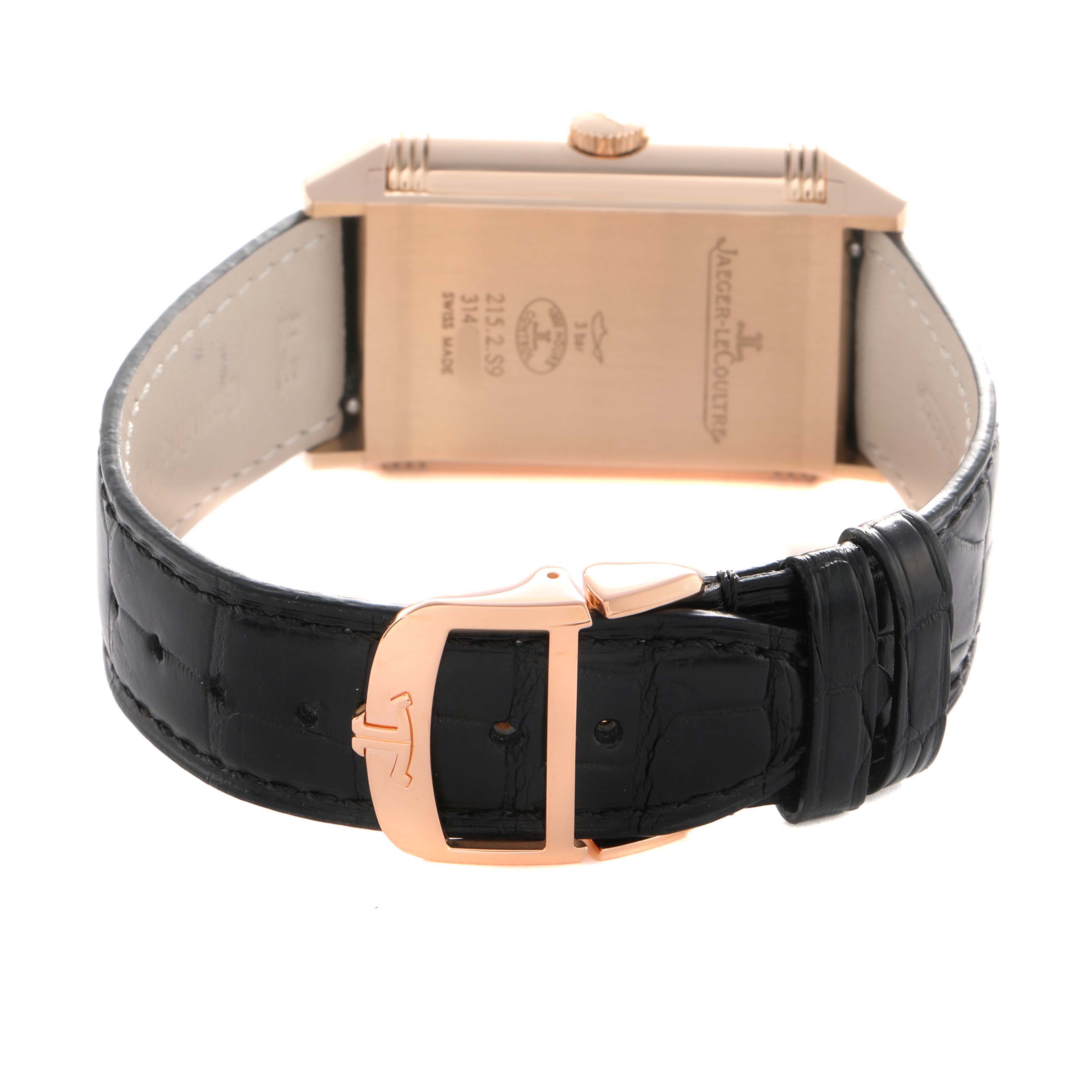 The image shows the back of the Jaeger LeCoultre Reverso Q3832420 Men's Rose Gold Silver Dial watch, highlighting the case back and black leather strap with a clasp.
