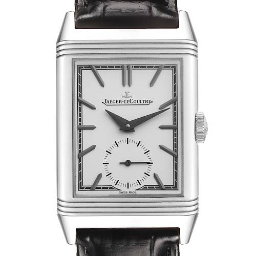 The Jaeger-LeCoultre Reverso watch is shown from a front angle, displaying the dial with hour markers, hands, and a leather strap.