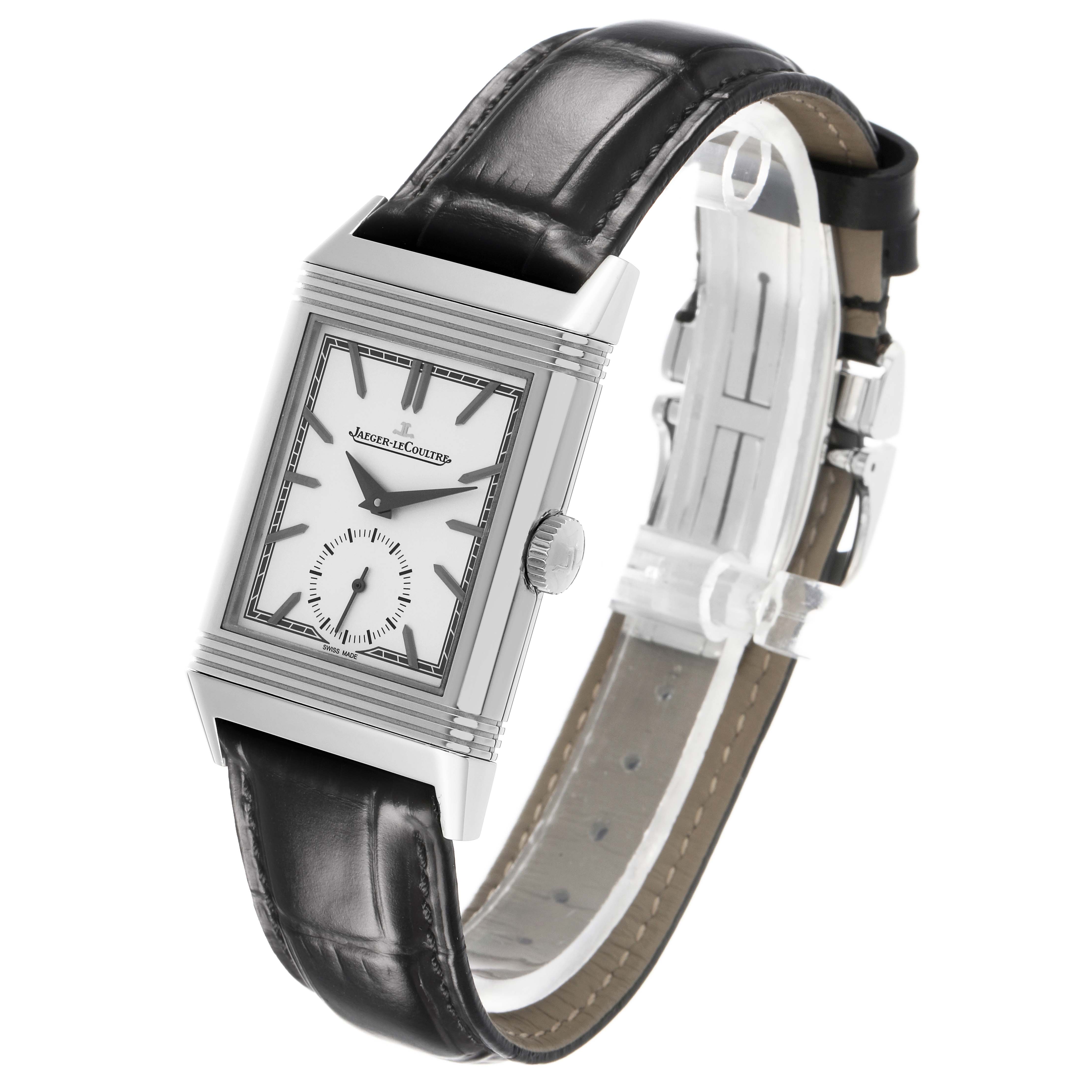The Jaeger-LeCoultre Reverso watch is shown from a slightly angled side view, displaying the face, crown, and leather strap.