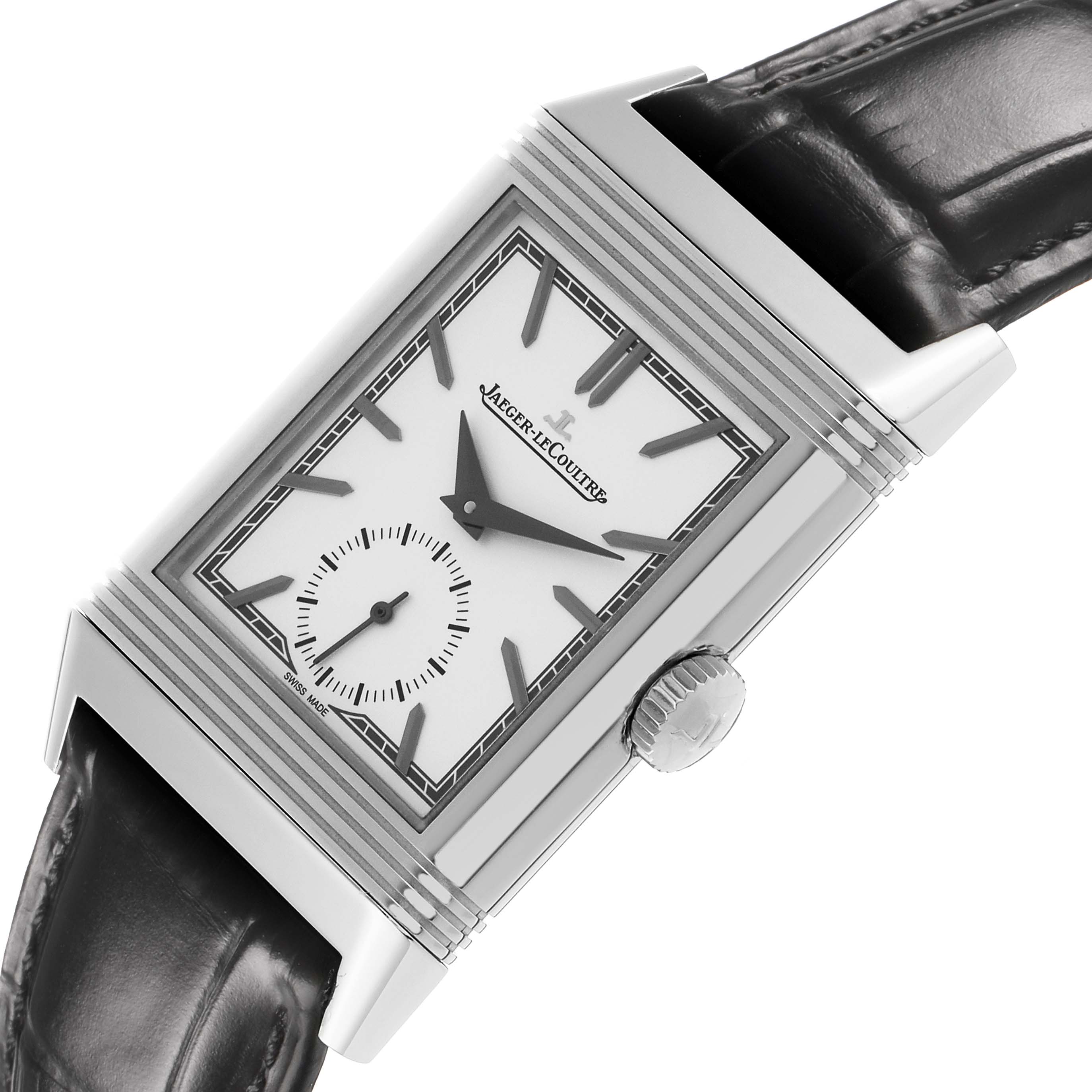 The Jaeger LeCoultre Reverso Q713842X Men's Stainless Steel Silver Dial watch is shown at a slight angle, highlighting its rectangular face, crown, and leather strap.