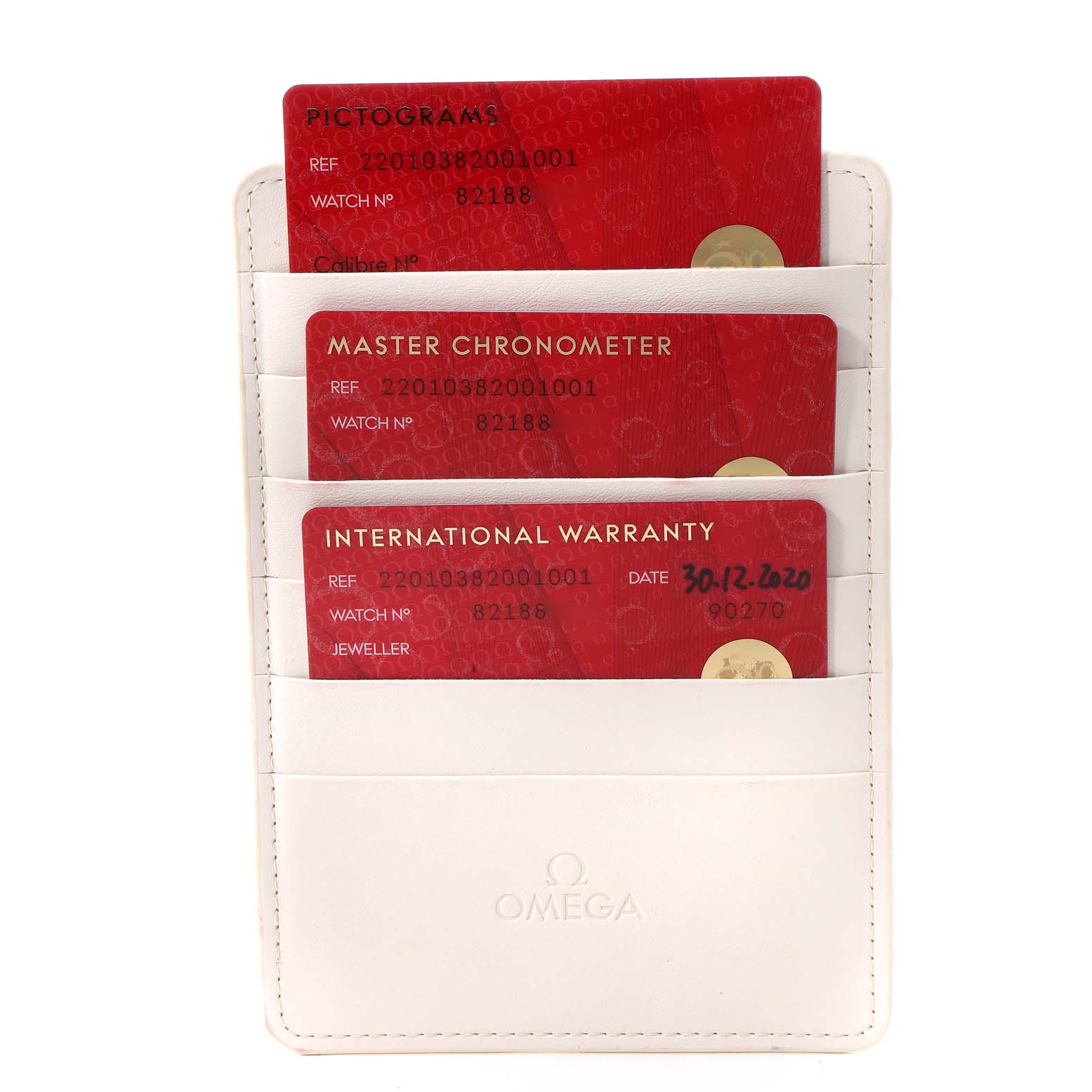 The image shows a white Omega cardholder with three red cards labeled Pictograms, Master Chronometer, and International Warranty for an Omega Aqua Terra 220.10.38.20.01.001 Men's Stainless Steel Black Dial 220.10.38.20.01.001 Men's Stainless Steel Black Dial watch.