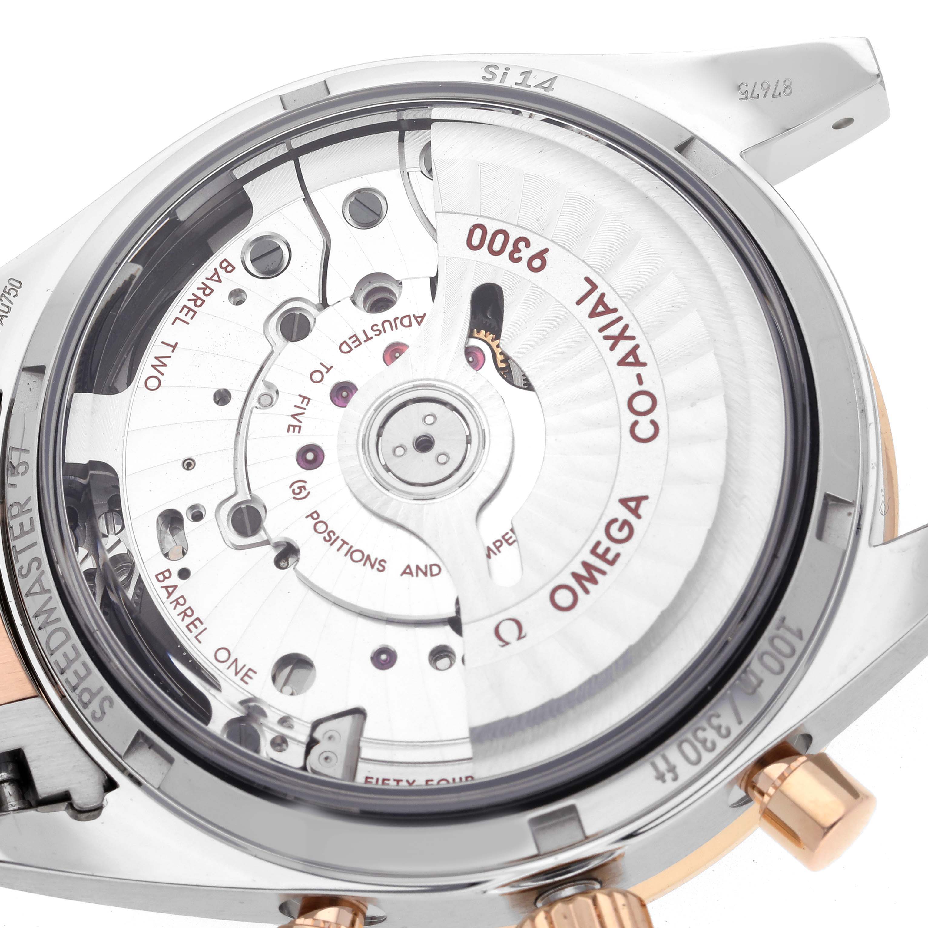 The image shows the back view of an Omega Speedmaster 331.20.42.51.01.002 Men's Steel and Gold (two tone) Black Dial 331.20.42.51.01.002 Men's Steel and Gold (two tone) Black Dial, highlighting its Co-Axial 9300 movement.