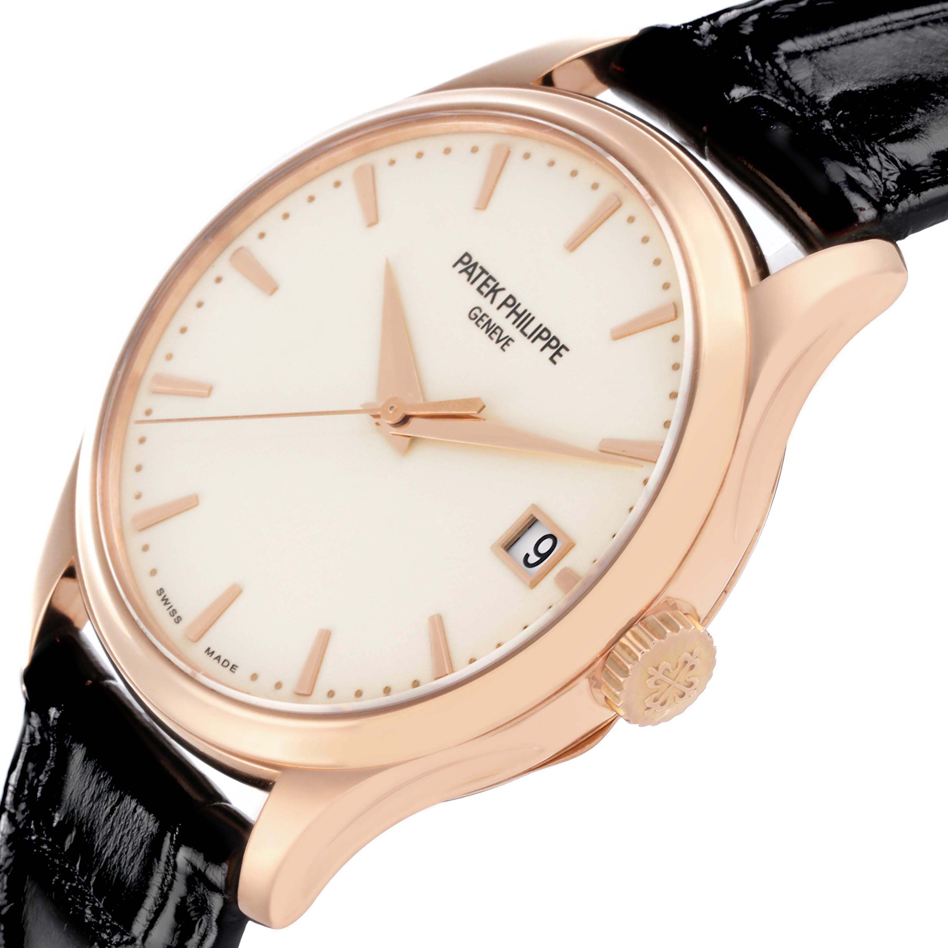 The Calatrava by Patek Philippe is shown at an angled close-up, detailing the dial, hands, crown, and part of the black leather strap.