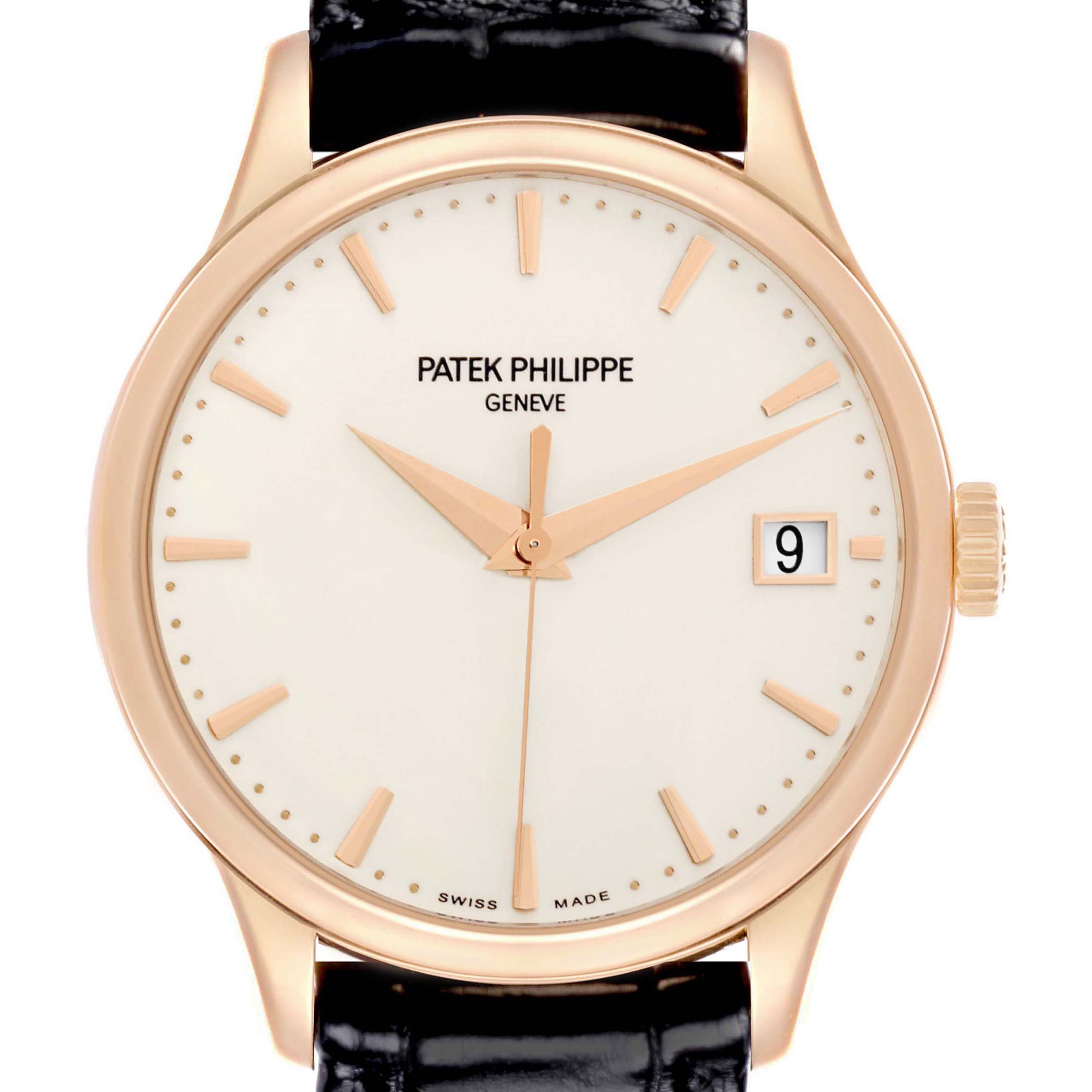 The image shows a front view of the Patek Philippe Calatrava 5227R-001 Men's Rose Gold Beige Dial watch, highlighting its dial, date window, and black strap.