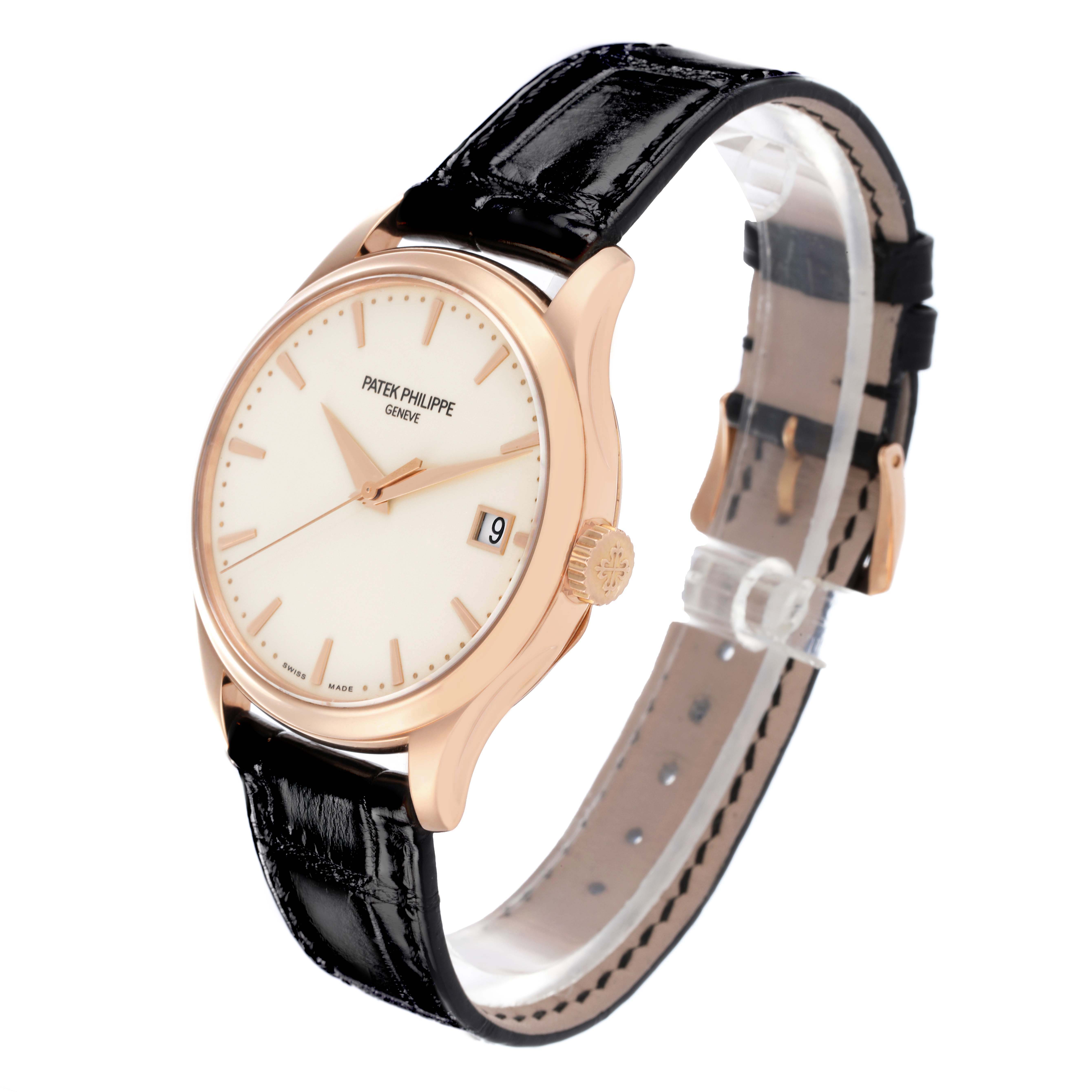 The Patek Philippe Calatrava 5227R-001 Men's Rose Gold Beige Dial watch is shown at an angle highlighting the face, crown, lugs, and black leather strap.