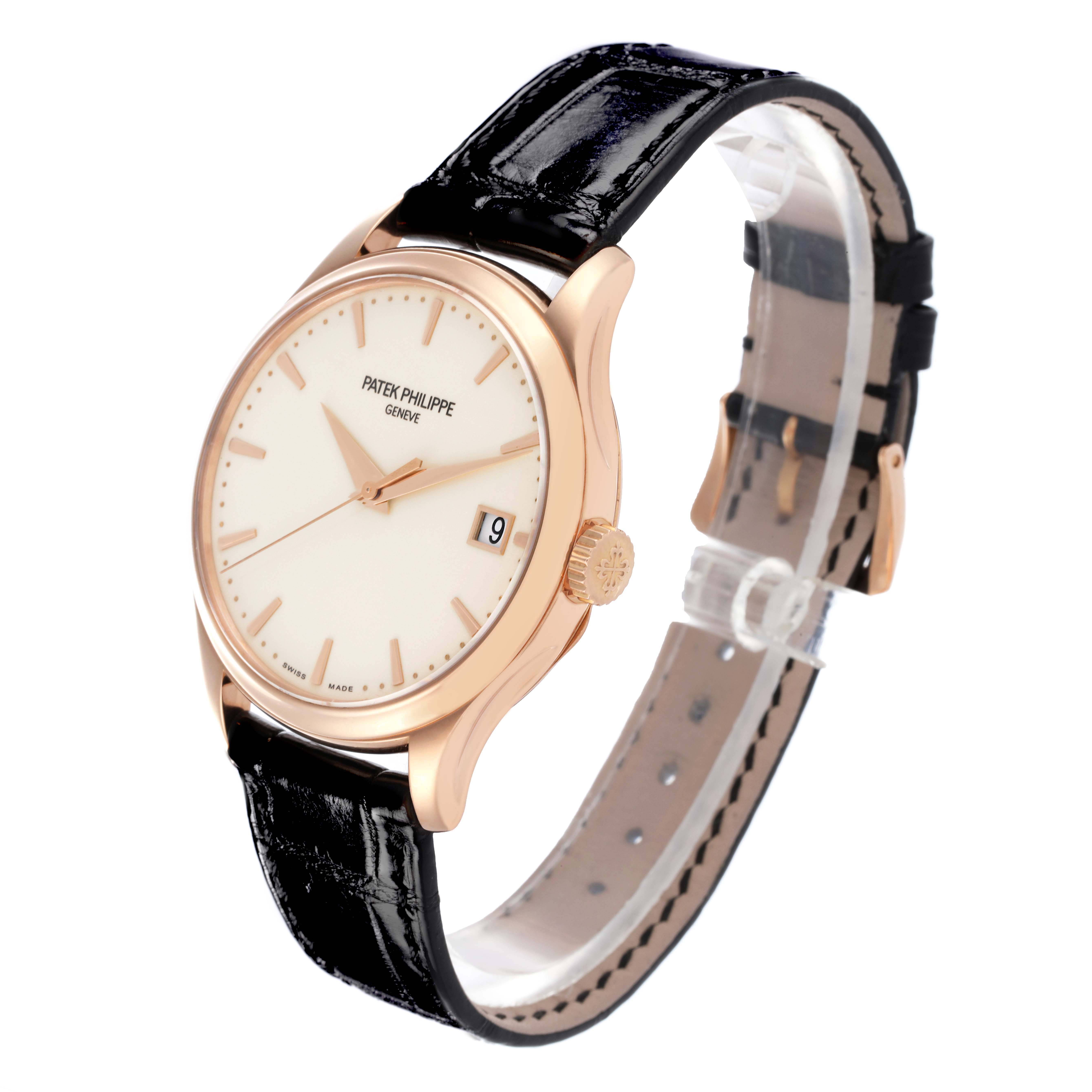 The Patek Philippe Calatrava 5227R-001 Men's Rose Gold Champagne Dial watch is shown at a three-quarter angle, highlighting the dial, crown, and black leather strap.