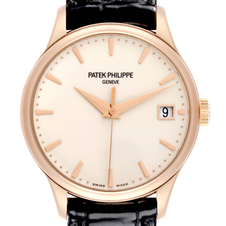 The image shows a front view of a Patek Philippe Calatrava watch, displaying the dial, hands, date, and crown.