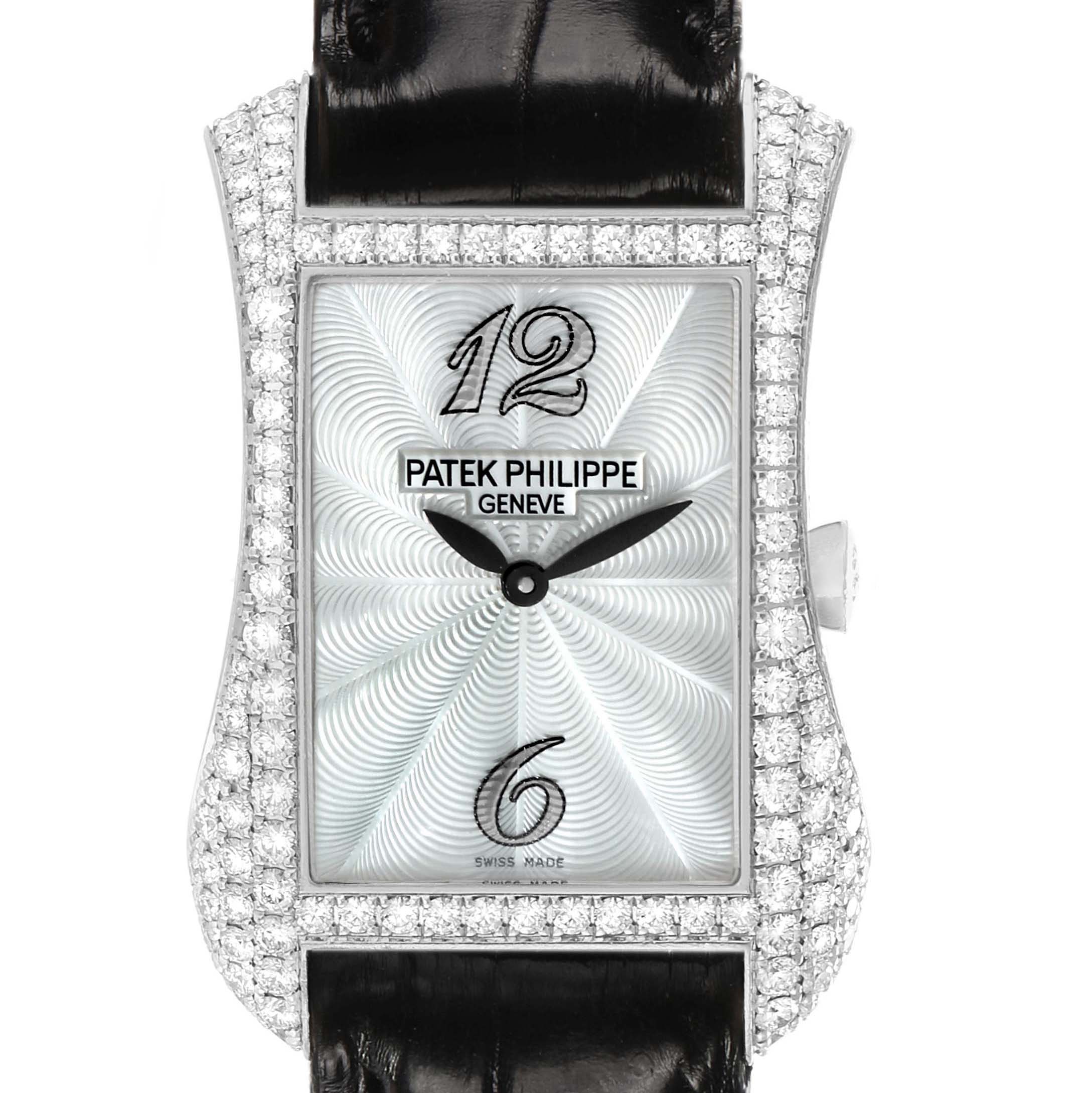 The Patek Philippe Gondolo 4973G Women's White Gold Mother of Pearl Dial watch is shown from the front, highlighting its rectangular dial, diamond-set bezel, and black strap.