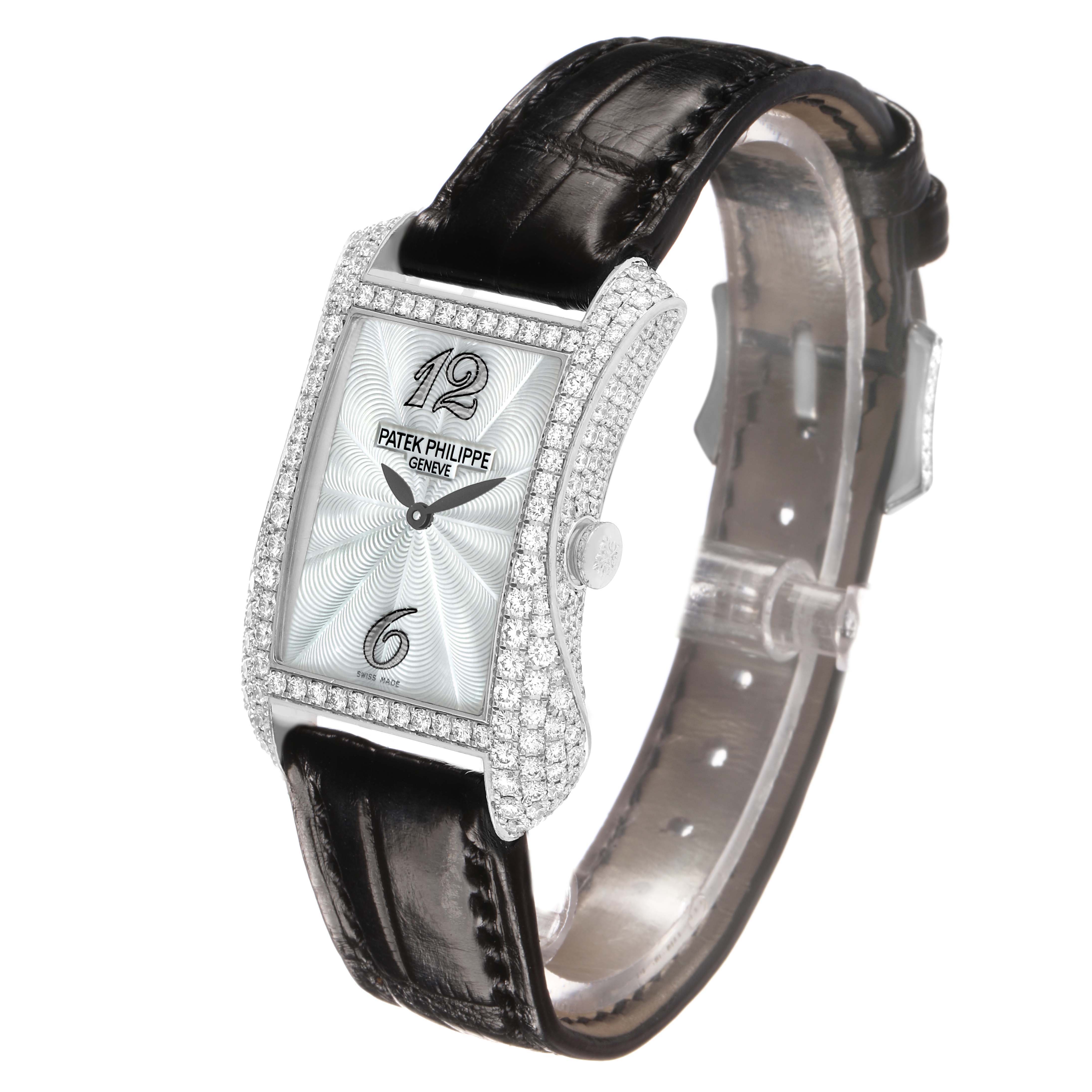 The Patek Philippe Gondolo 4973G Women's White Gold Mother of Pearl Dial watch is shown at a three-quarter angle, highlighting the diamond-set bezel and leather strap.