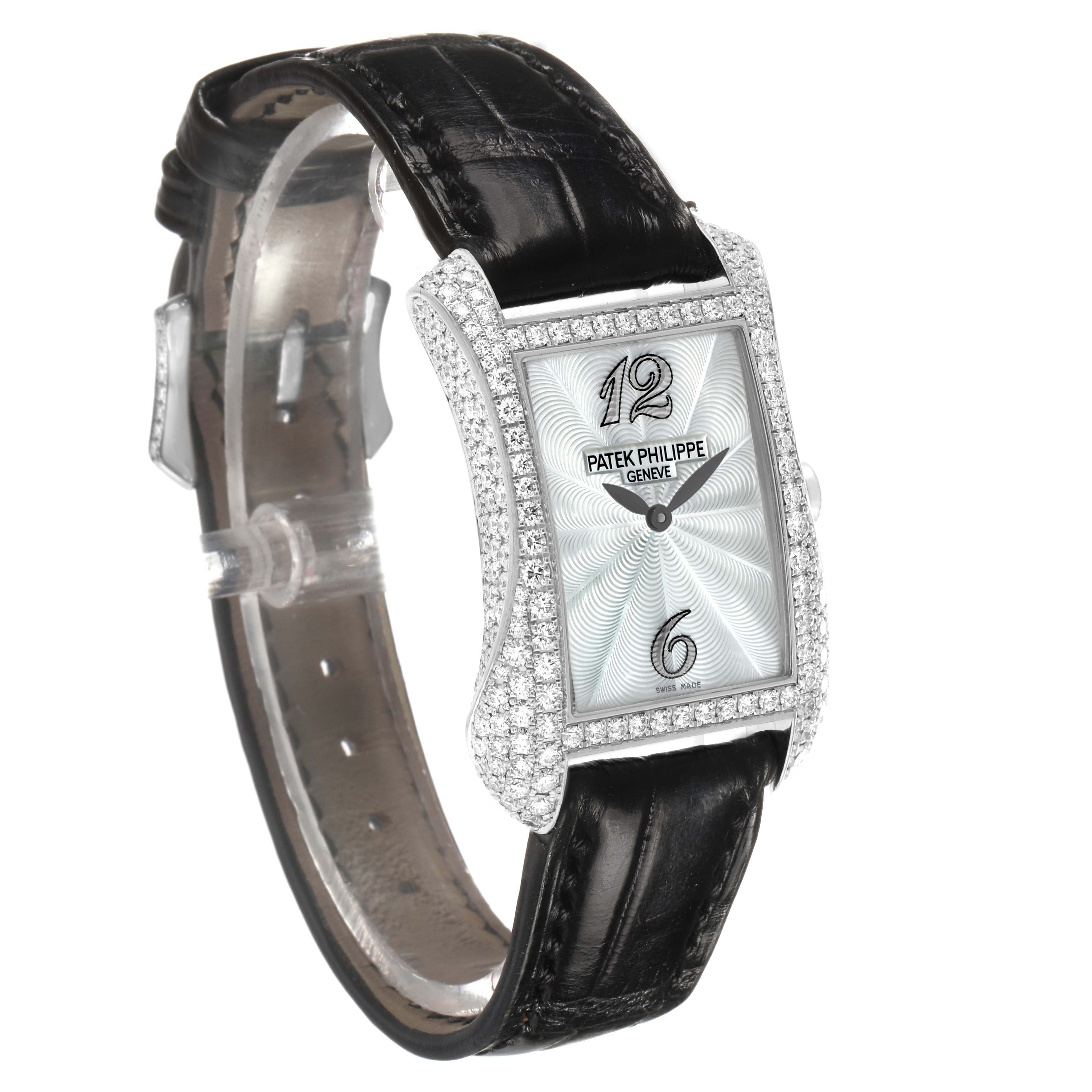The Patek Philippe Gondolo 4973G Women's White Gold Mother of Pearl Dial watch is shown at a slight angle, displaying the face with diamond bezel and black leather strap.