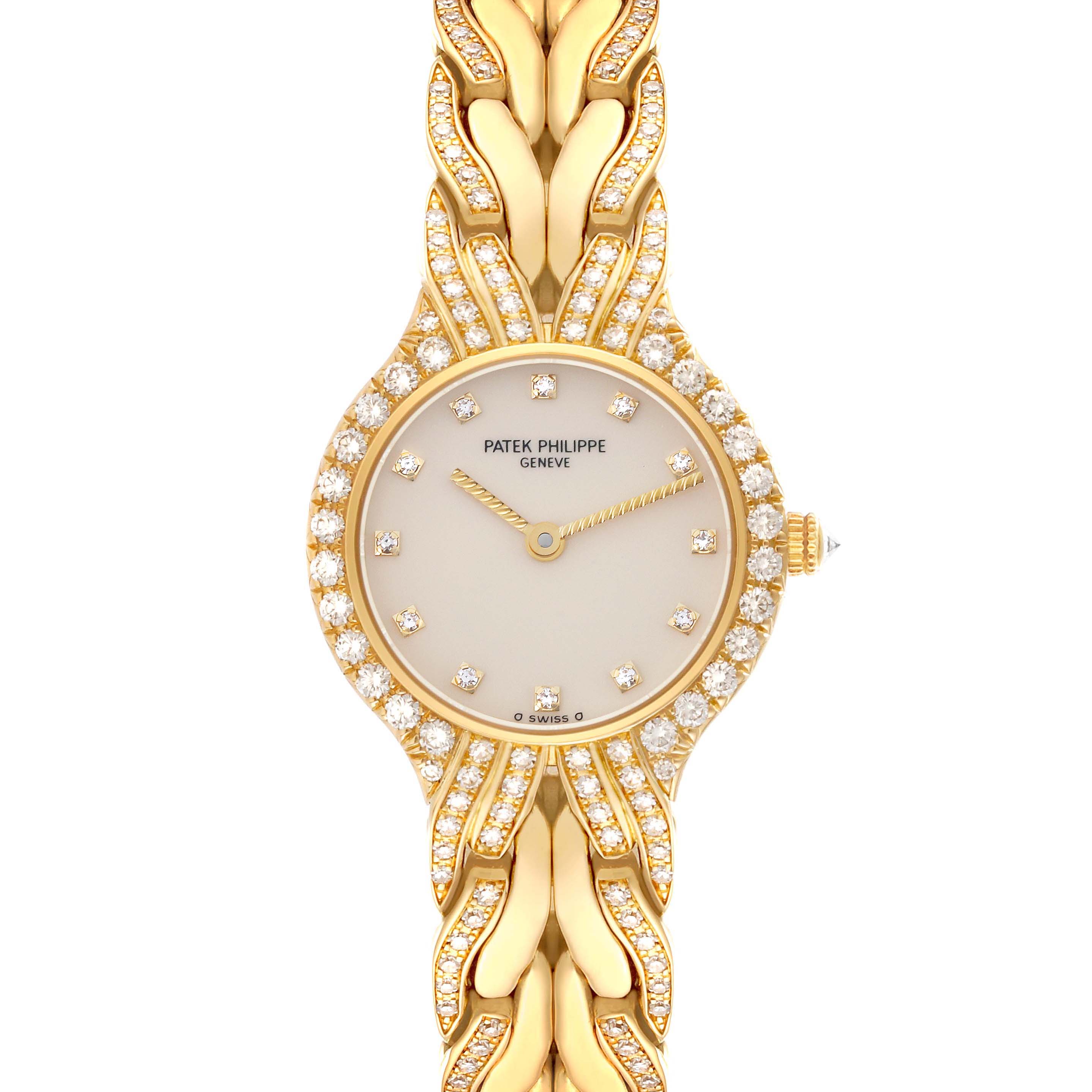 The Patek Philippe La Flamme  4816/3J Women's Yellow Gold Champagne Dial 4816/3J Women's Yellow Gold Champagne Dialwatch is shown from a top view, highlighting its diamond-studded bezel and intricate bracelet.