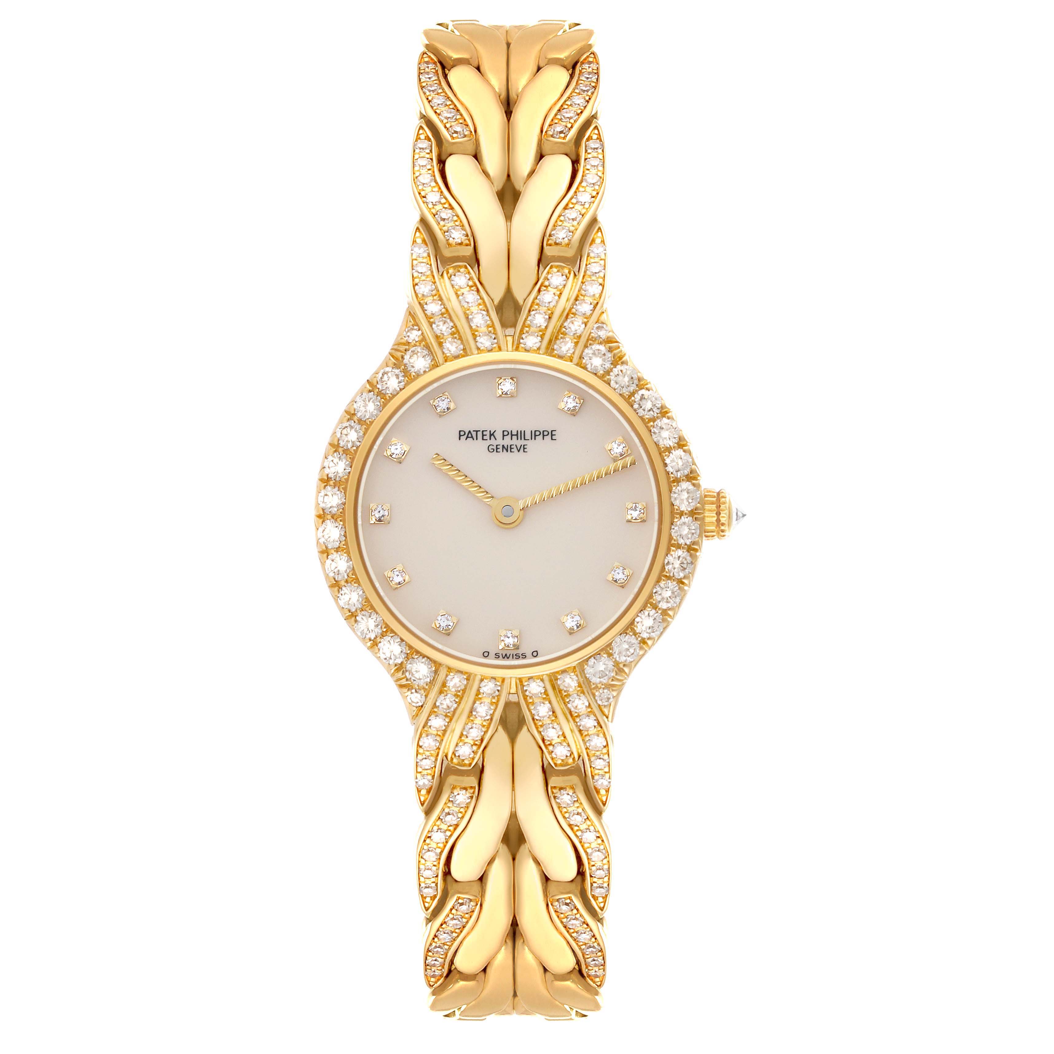The Patek Philippe La Flamme  4816/3J Women's Yellow Gold Champagne Dial 4816/3J Women's Yellow Gold Champagne Dialwatch is shown from a top view, displaying the face, bezel, and decorative bracelet.