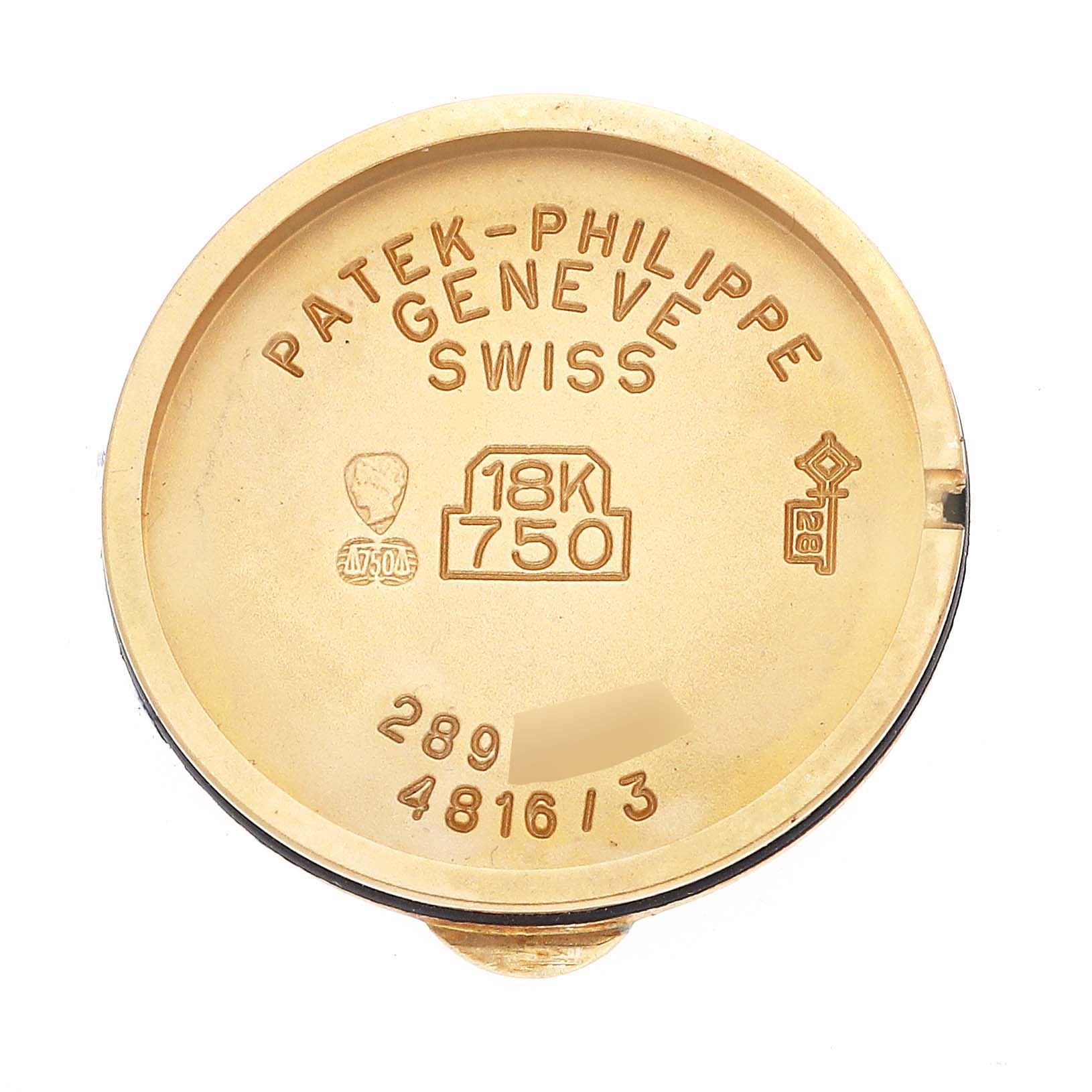 The image shows the inside case back of a Patek Philippe La Flamme  4816/3J Women's Yellow Gold Champagne Dial 4816/3J Women's Yellow Gold Champagne Dialwatch, highlighting markings for gold content and manufacturer.