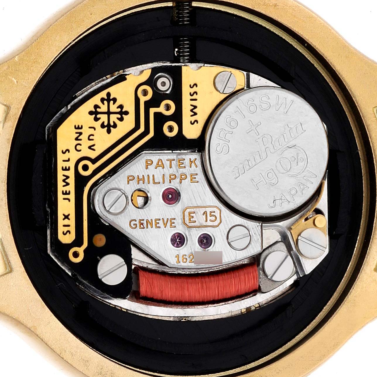 The image shows the back view of the movement of a Patek Philippe La Flamme  4816/3J Women's Yellow Gold Champagne Dial 4816/3J Women's Yellow Gold Champagne Dialwatch, revealing the battery and inner components.
