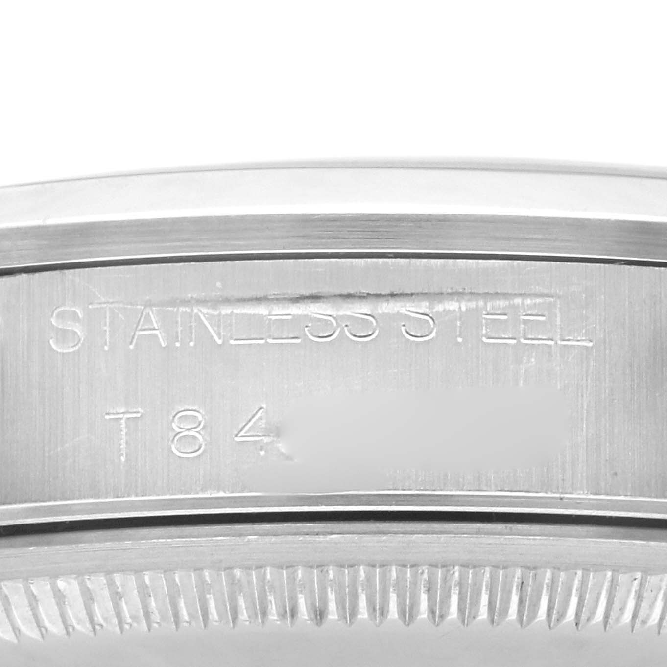 The image shows a close-up side view of the Rolex Air-King 14000 Men's Stainless Steel Silver Dial 14000 Men's Stainless Steel Silver Dial watch, highlighting the stainless steel case with engraved text.