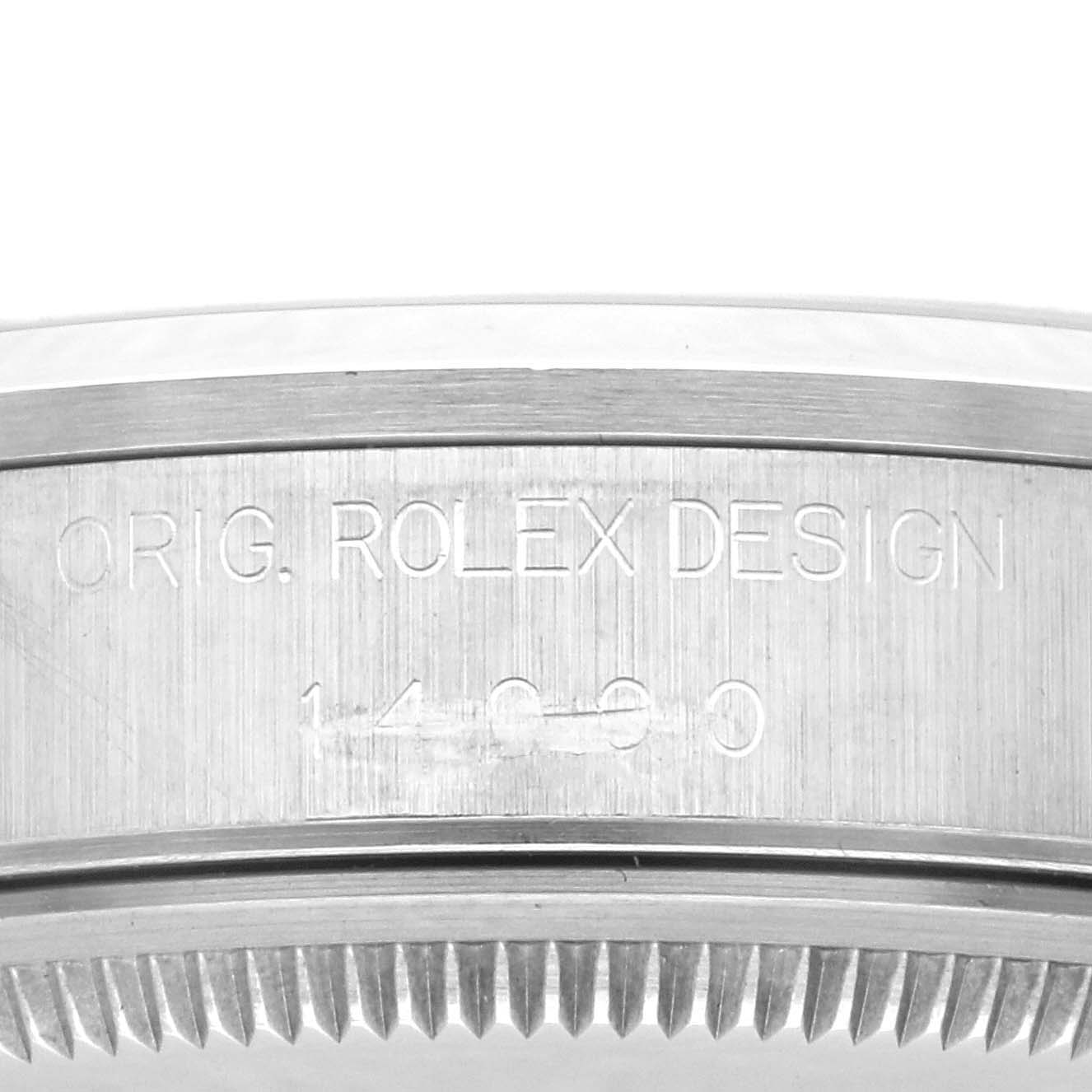 The image shows a close-up of the side of the bezel with engravings on the Rolex Air-King 14000 Men's Stainless Steel White Dial 14000 Men's Stainless Steel White Dial watch.