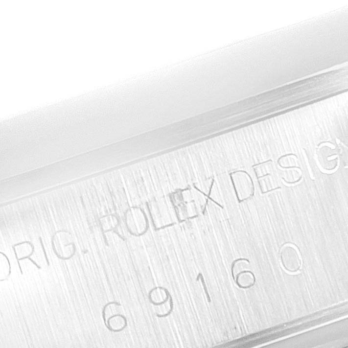 The image shows a close-up of the casing with the model number "69160" engraved on a Rolex Date 69160 Women's Stainless Steel Black Dial 69160 Women's Stainless Steel Black Dial watch.