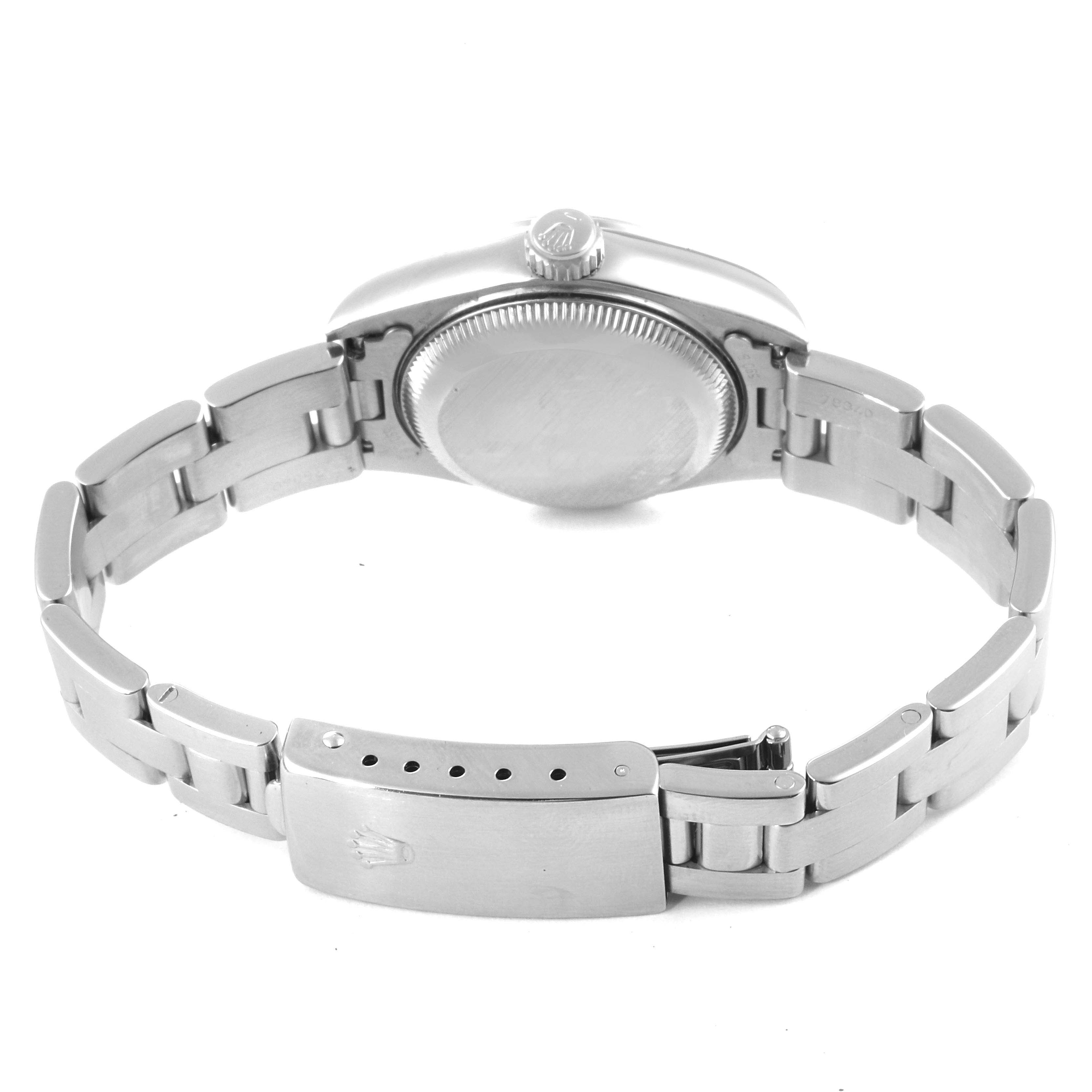 This image shows the back view of a Rolex Date 69160 Women's Stainless Steel Silver Dial 69160 Women's Stainless Steel Silver Dial model watch, highlighting its case back, crown, and bracelet with clasp.