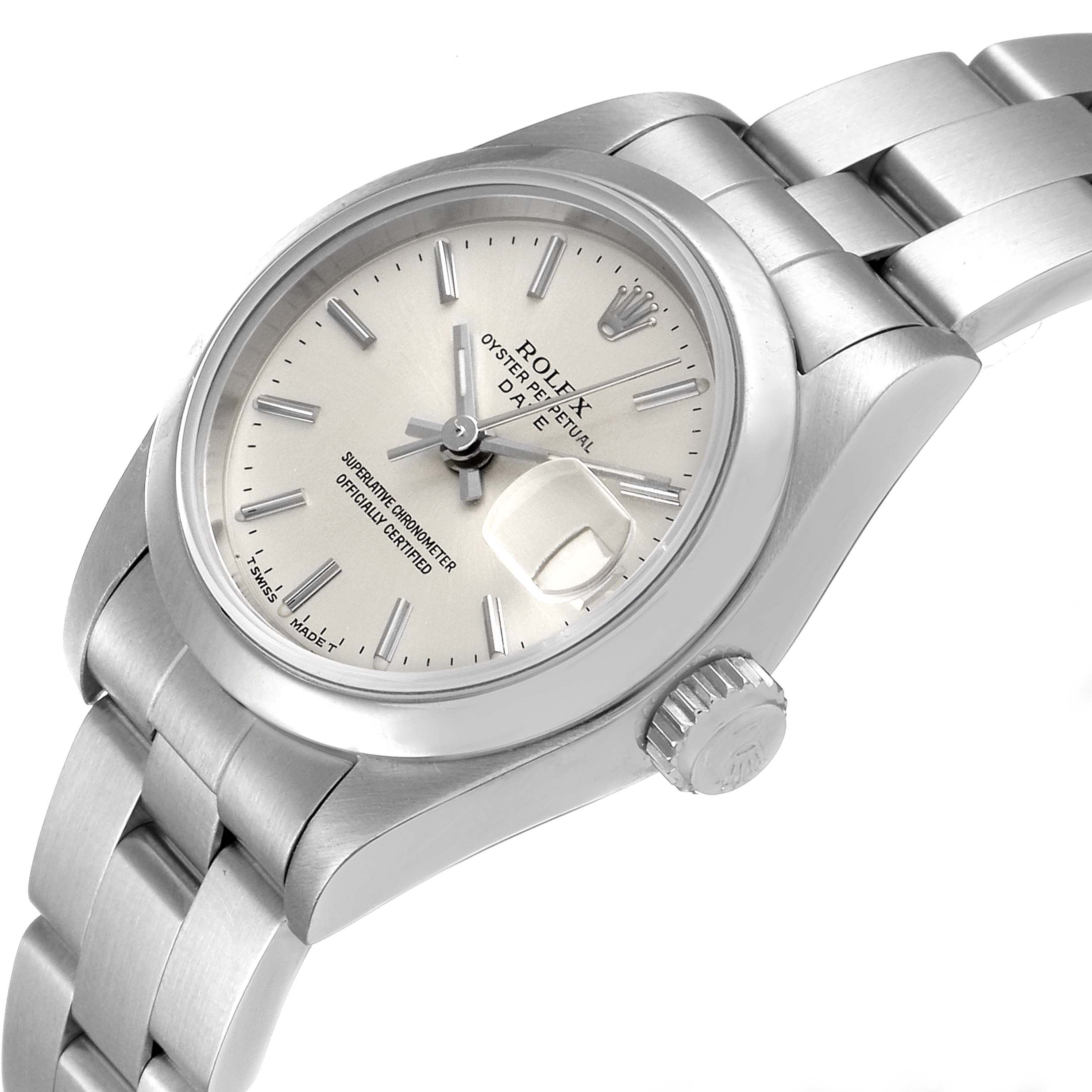 The image shows a side angle view of the Rolex Date 69160 Women's Stainless Steel Silver Dial 69160 Women's Stainless Steel Silver Dial model watch, displaying the dial, crown, and bracelet.