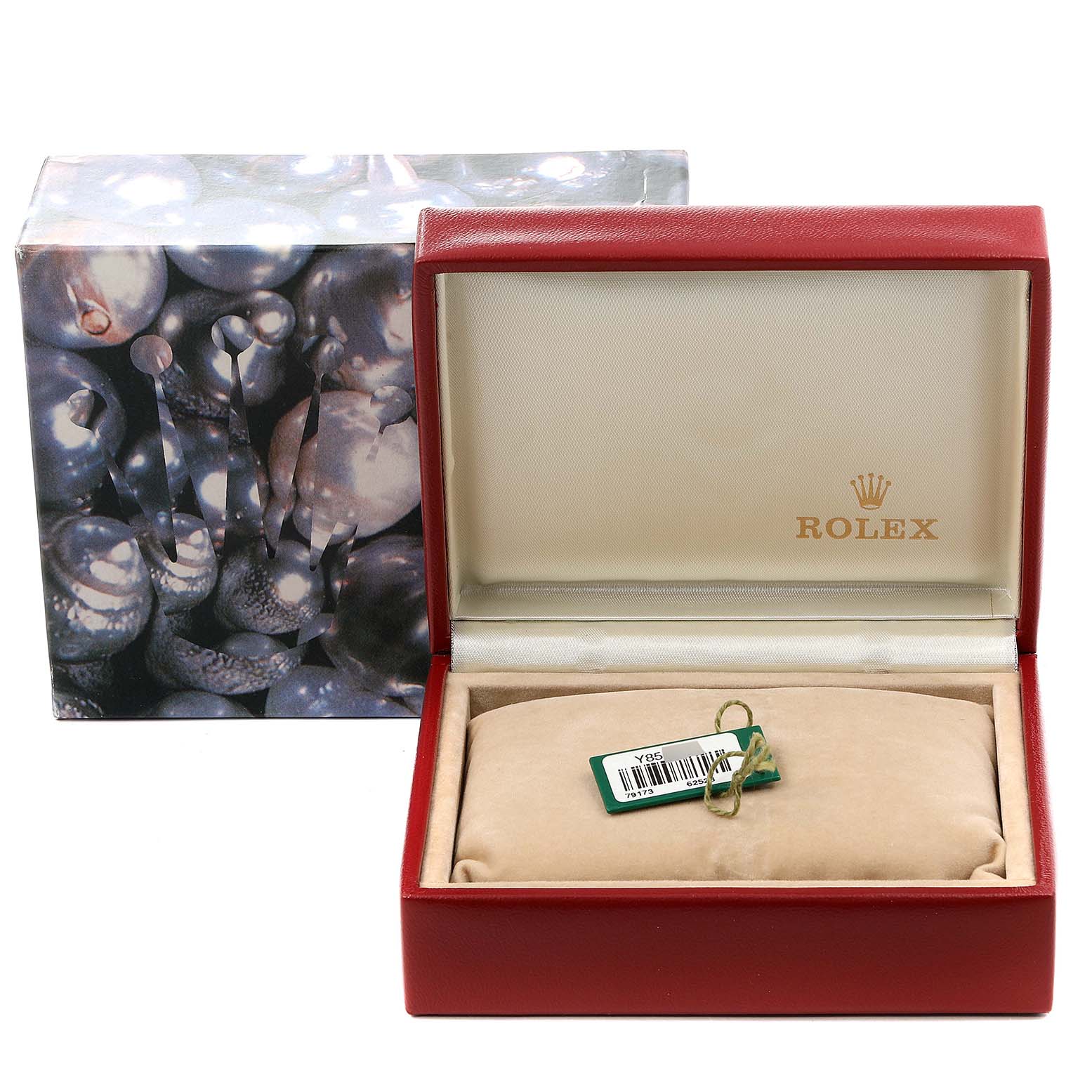 The image shows the Rolex Datejust 79174 Women's Stainless Steel Mother of Pearl Dial 79174 Women's Stainless Steel Mother of Pearl Dial watch's open red box with a cushion and tag, alongside its outer decorative box.