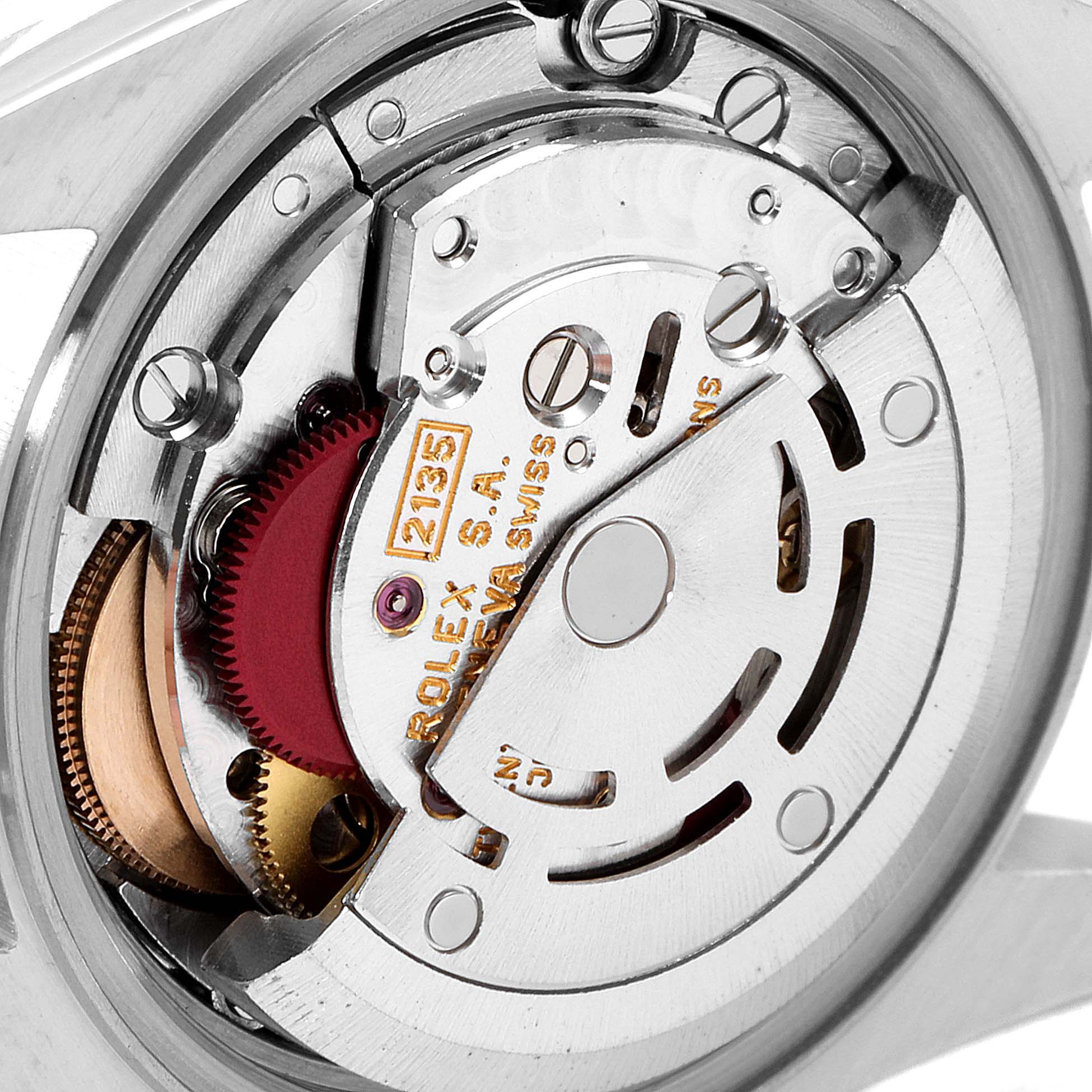 This is a close-up view of the movement inside a Rolex Datejust 69173 Women
s Steel and Gold (two tone) Champagne Dial 69173 Women
s Steel and Gold (two tone) Champagne Dial watch, showing its intricate machinery and components.