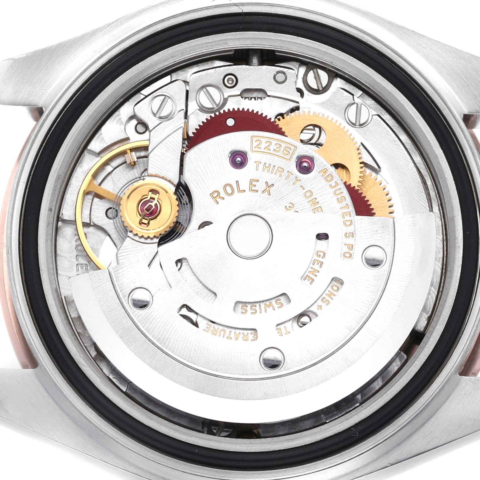 The image shows the internal movement of the Rolex Datejust 279381 Women's Steel and Gold (two tone) Brown Dial watch from a top-down angle, revealing gears and rotor.