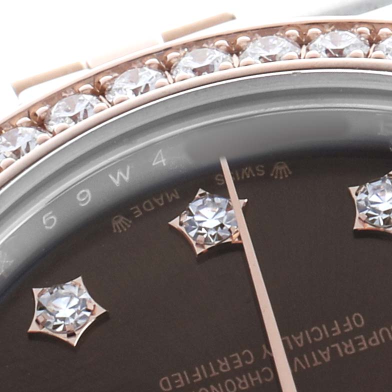 The image shows a close-up of a Rolex Datejust 279381 Women's Steel and Gold (two tone) Brown Dial watch with a diamond-studded bezel and diamond hour markers.
