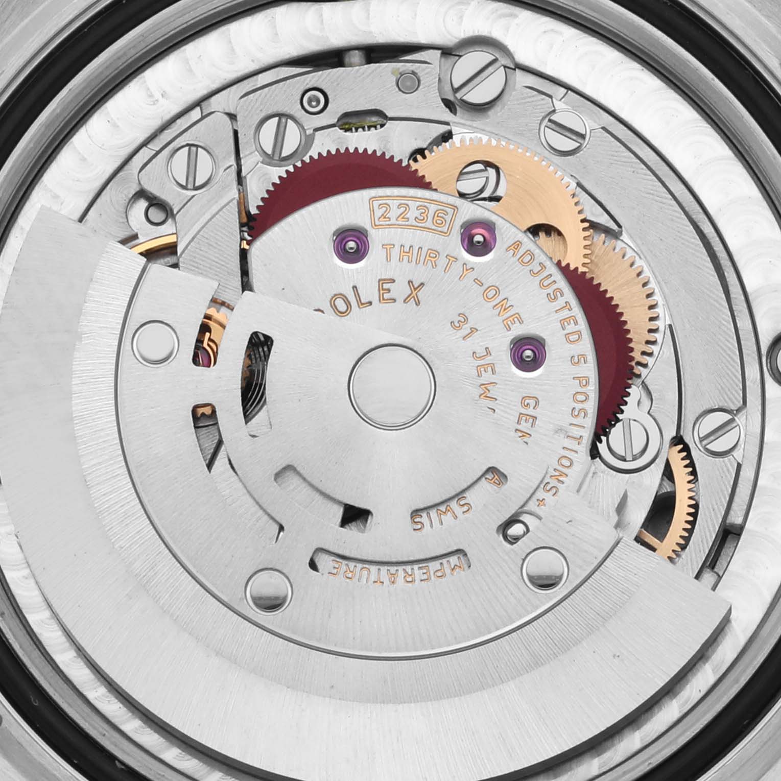 This image shows the internal mechanism of the Rolex Mid-Size 278274 Women's Stainless Steel Silver Dial 278274 Women's Stainless Steel Silver Dial watch at an angled close-up.