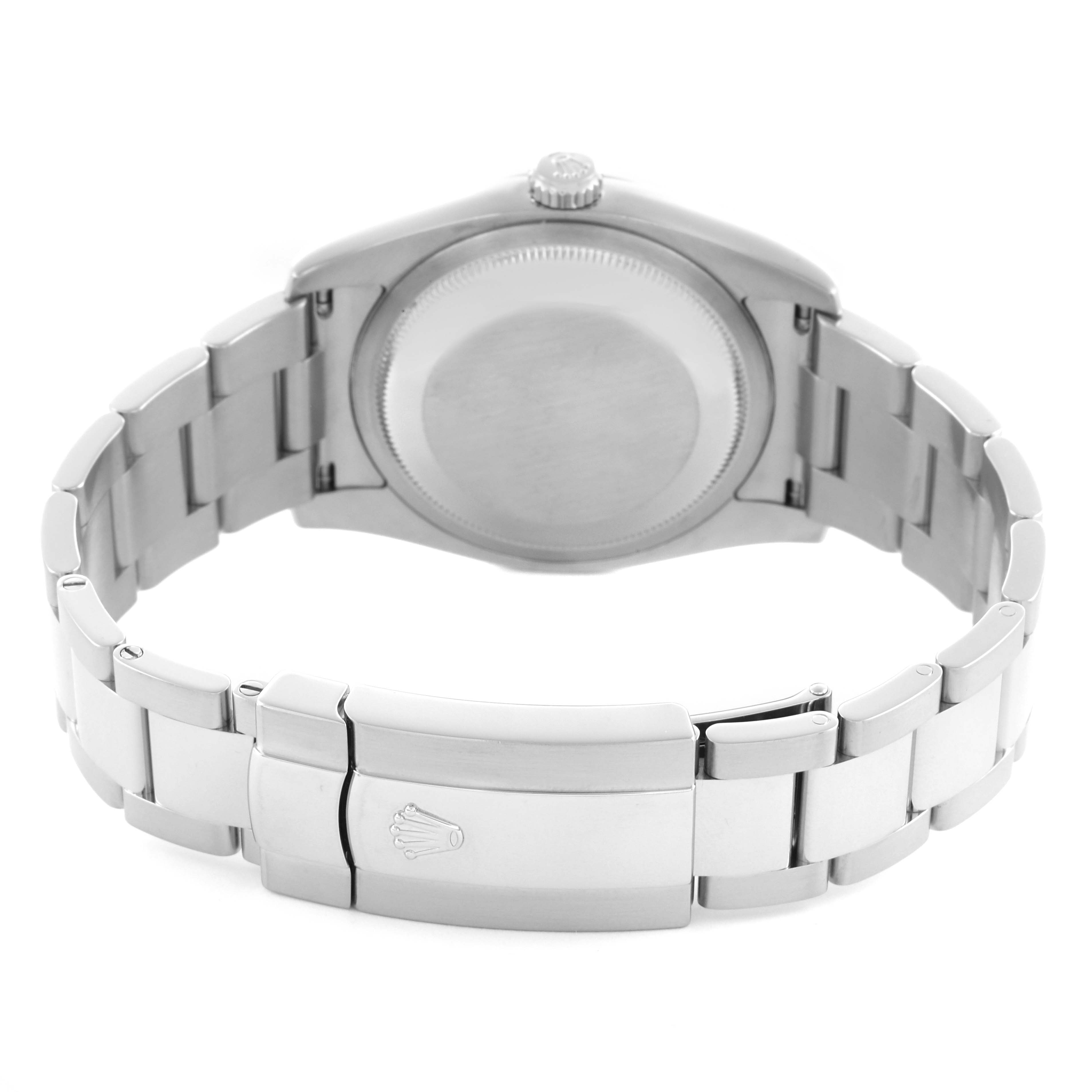 The image shows a Rolex Datejust 116200 Men's Stainless Steel Black Dial 116200 Men's Stainless Steel Black Dial from the back, highlighting the case back and part of the bracelet with the clasp.