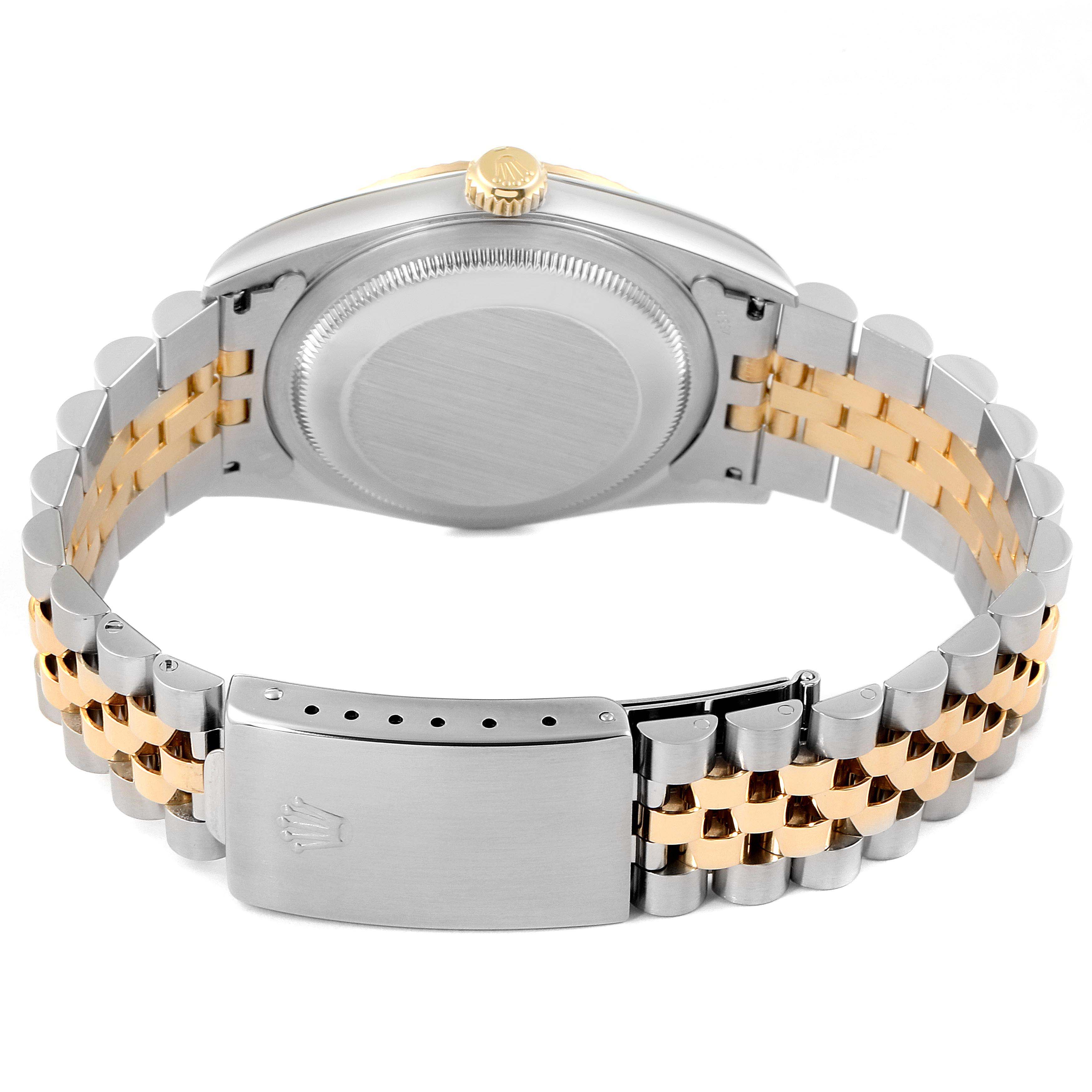 This image shows the back of the Rolex Datejust 16233 Men's Steel and Gold (two tone) Champagne Dial 16233 Men's Steel and Gold (two tone) Champagne Dial watch, highlighting its two-tone bracelet and clasp.