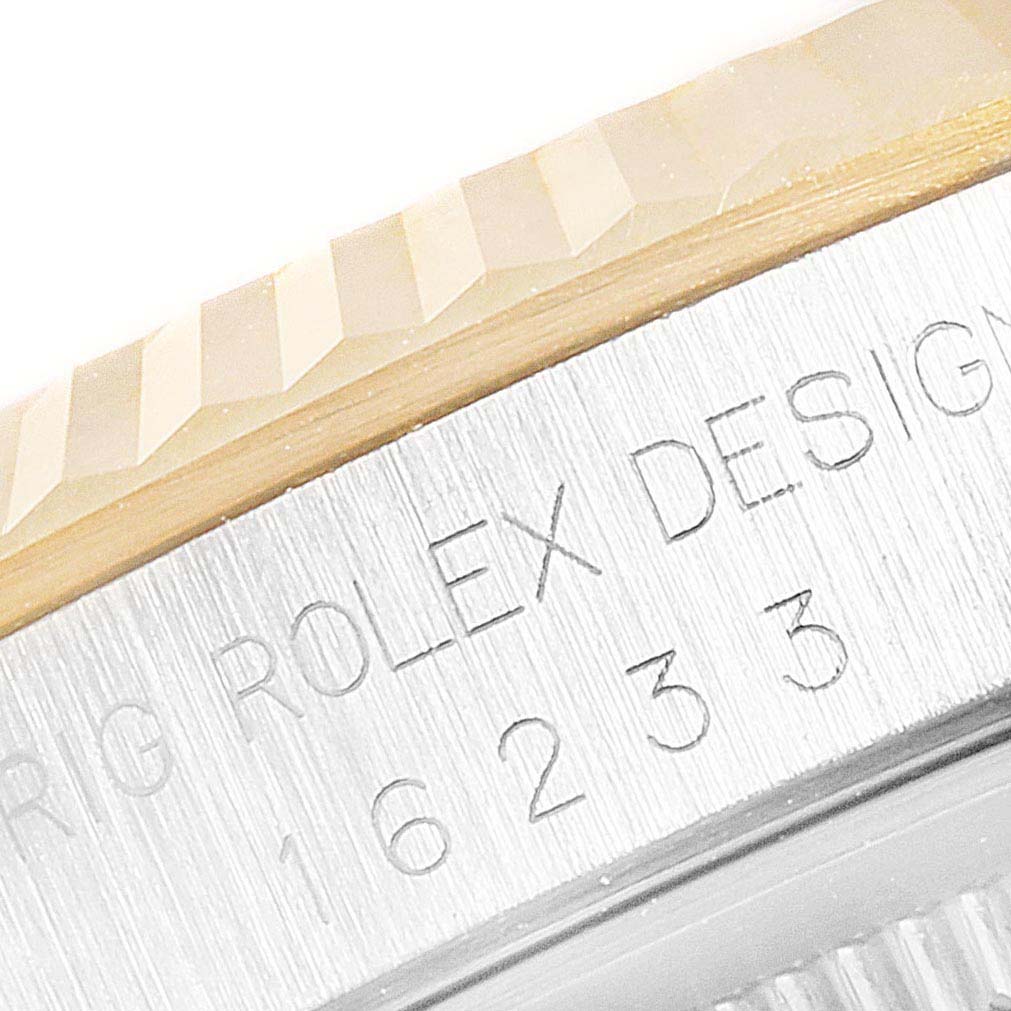 The image shows a close-up of the side edge of the bezel and case, revealing Rolex Datejust 16233 Men's Steel and Gold (two tone) Champagne Dial 16233 Men's Steel and Gold (two tone) Champagne Dial’s model number 16233 engraving.