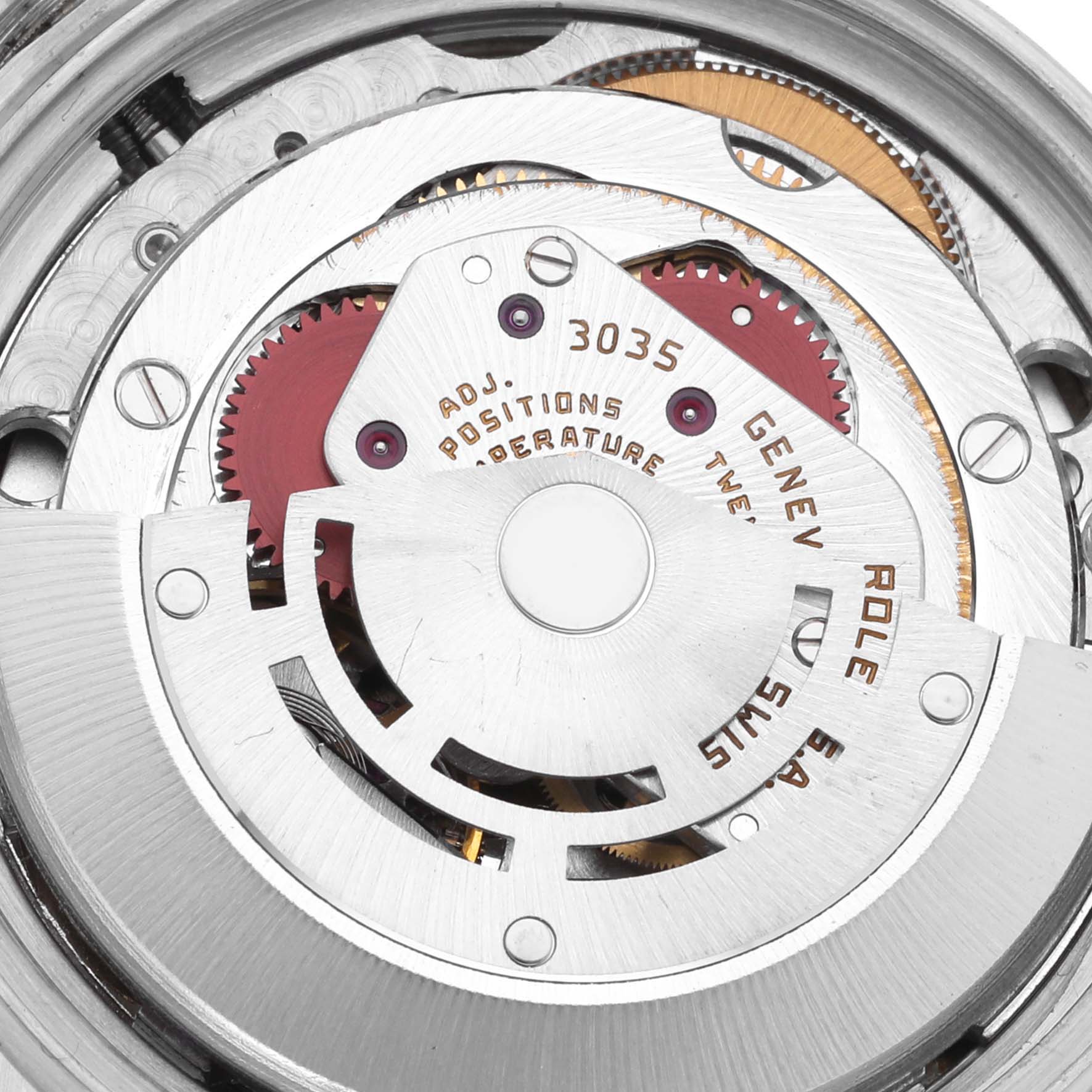 The image shows a close-up view of the movement inside a Rolex Datejust 16013 Men's Steel and Gold (two tone) Champagne Dial 16013 Men's Steel and Gold (two tone) Champagne Dial watch, highlighting its intricate mechanical components.