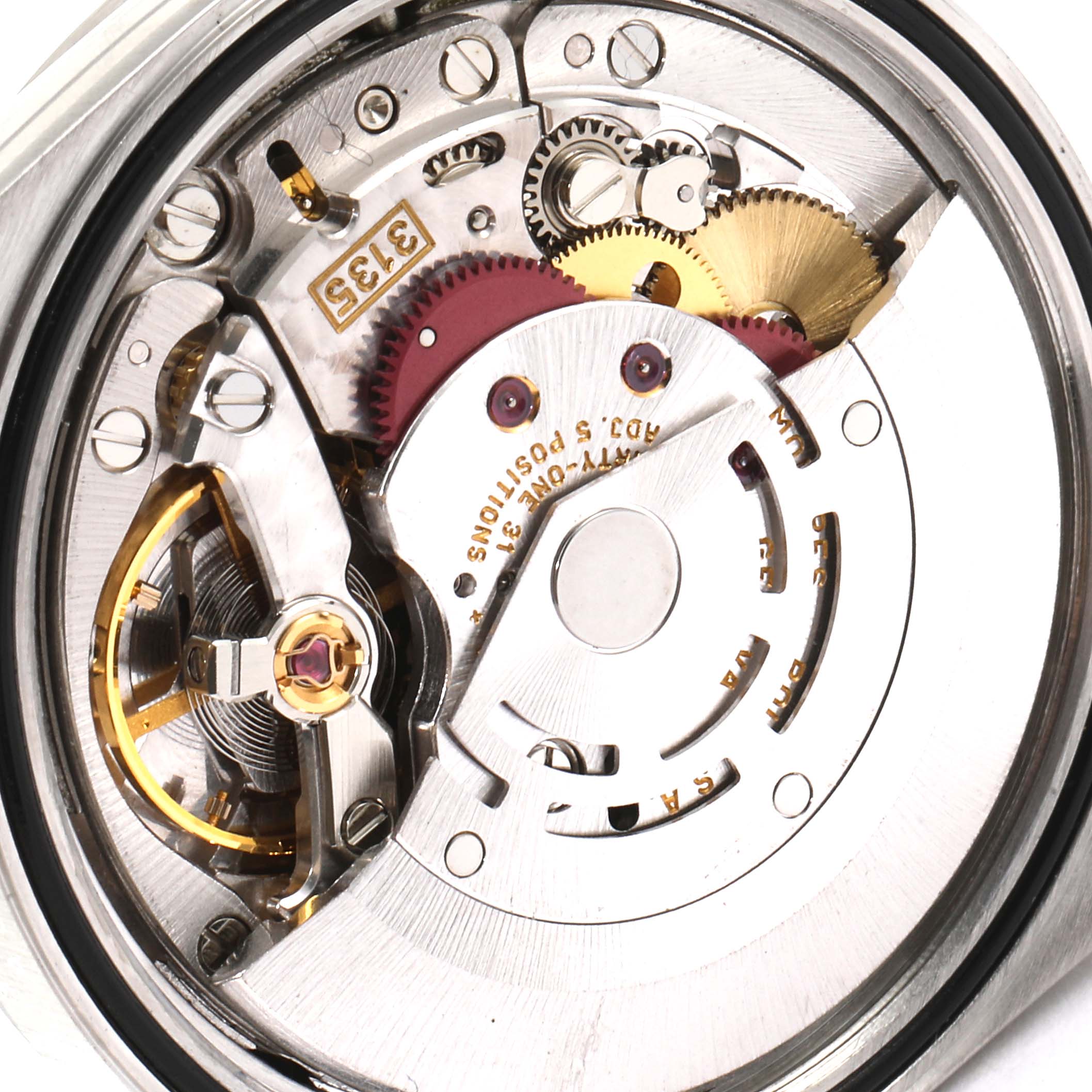 This image shows the internal mechanism of a Rolex Datejust 16200 Men's Stainless Steel Blue Dial 16200 Men's Stainless Steel Blue Dial watch, highlighting gears and intricate components from a close-up angle.