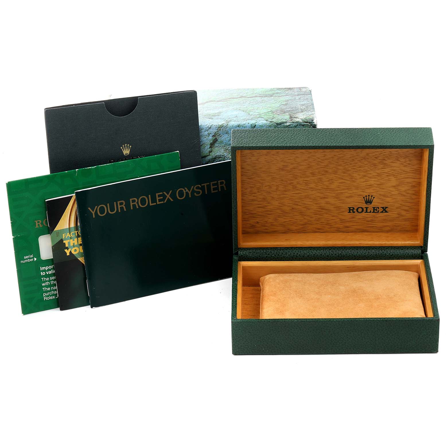 This image shows the packaging and accessories of the Rolex Datejust 16200 Men's Stainless Steel Blue Dial 16200 Men's Stainless Steel Blue Dial, including the box, pillow, and booklets.