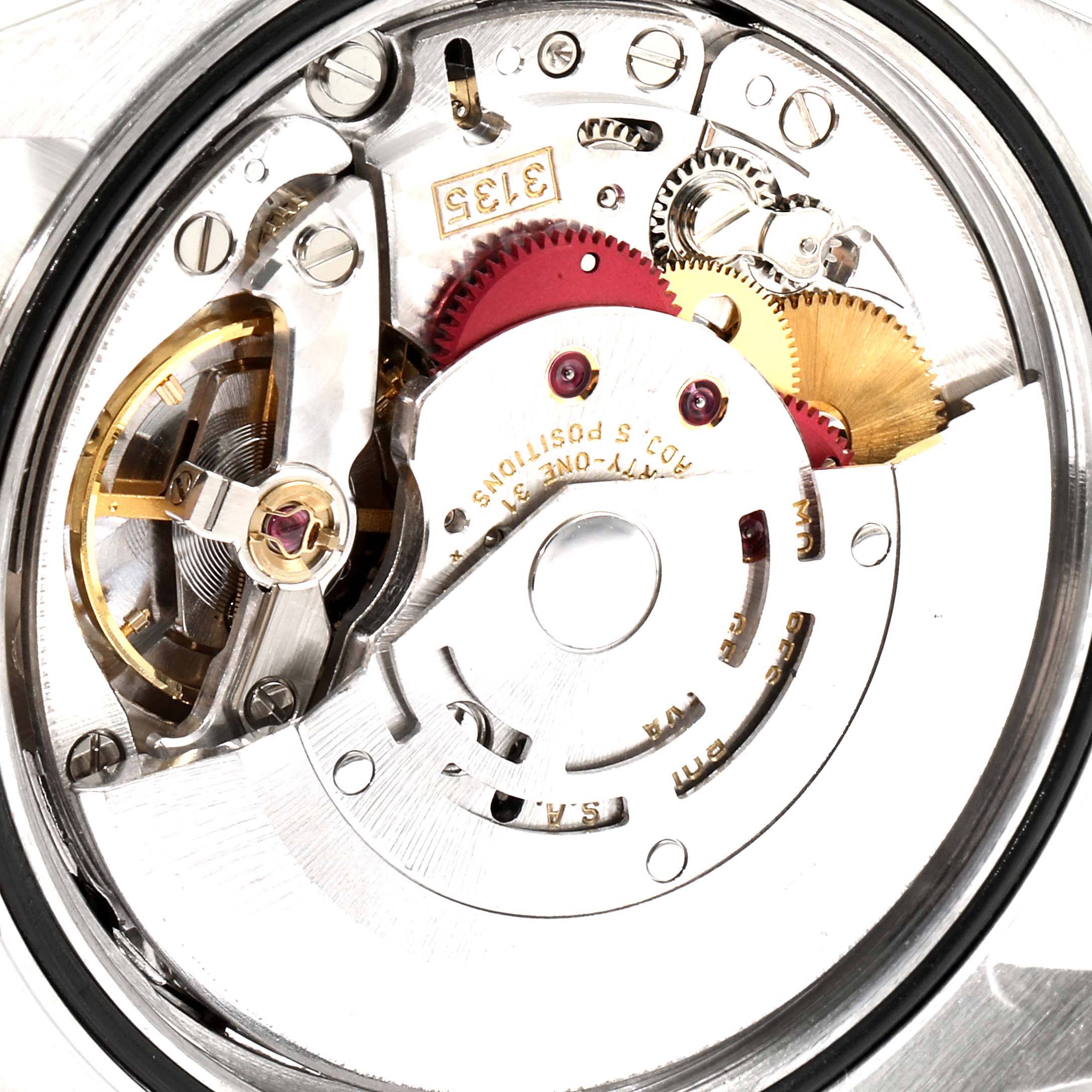 The image shows the intricate internal mechanism of a Rolex Datejust 16220 Men's Stainless Steel Blue Dial 16220 Men's Stainless Steel Blue Dial watch, including gears and the rotor, viewed from the back.