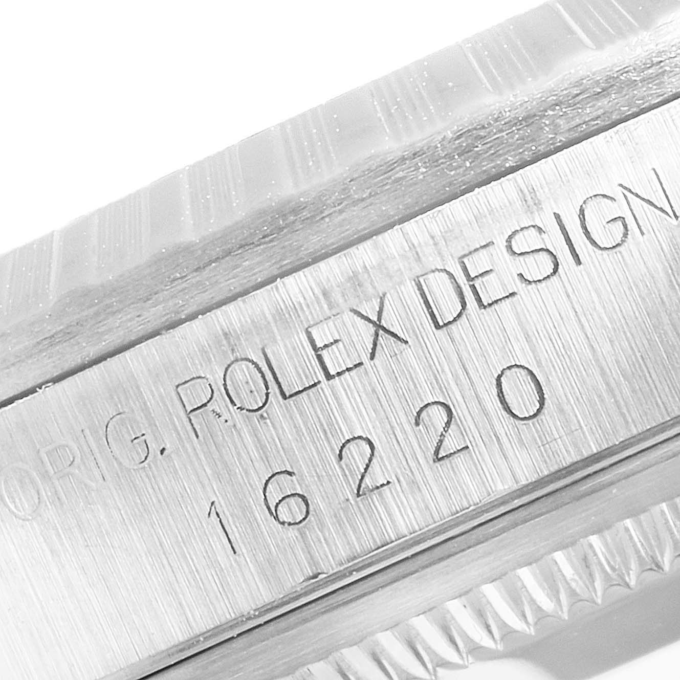 This image shows a close-up of the side of a Rolex Datejust 16220 Men's Stainless Steel Blue Dial 16220 Men's Stainless Steel Blue Dial watch case featuring the engraved model number 16220.