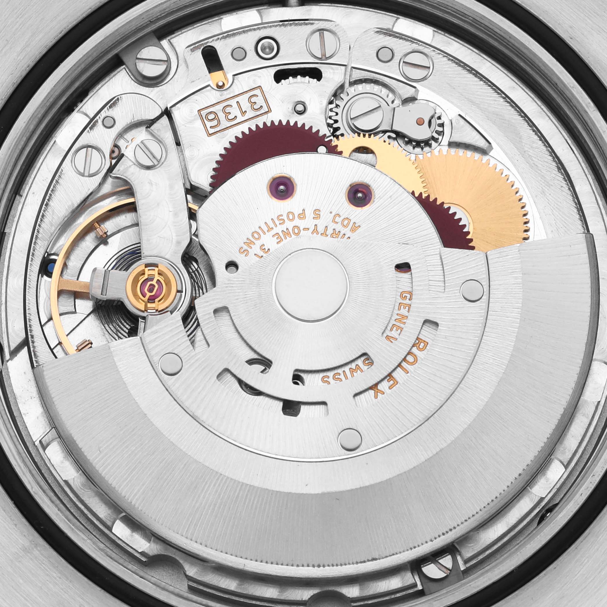 The image shows the intricate inner mechanism of a Rolex Datejust 41 116334 Men's Stainless Steel Blue Dial 116334 Men's Stainless Steel Blue Dial watch from a direct overhead angle.