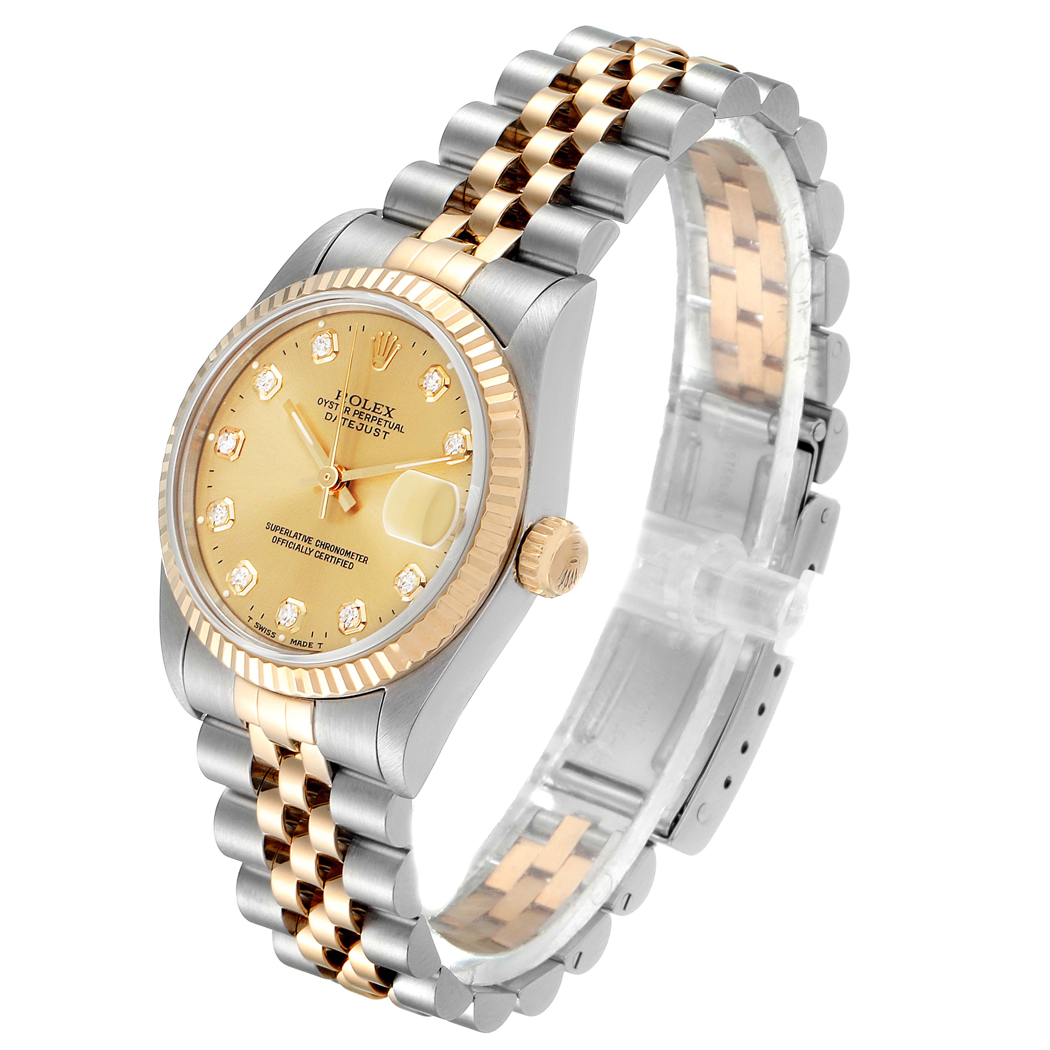 The image shows a Rolex Mid-Size 68273 Women's Steel and Gold (two tone) Champagne Dial 68273 Women's Steel and Gold (two tone) Champagne Dial watch from a three-quarter top view, highlighting the face, bezel, crown, and bracelet.