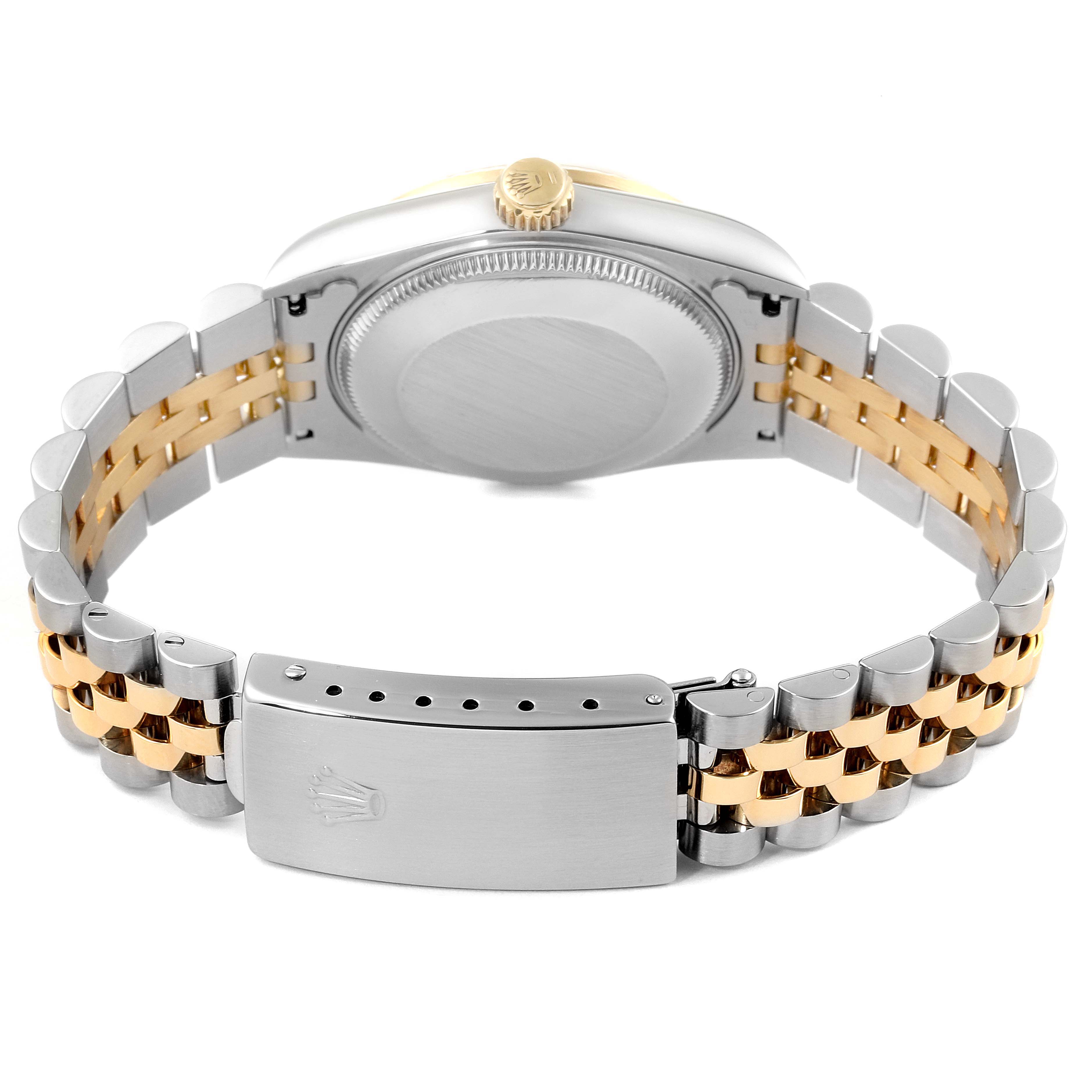 This image shows the back view of a Rolex Mid-Size 68273 Women's Steel and Gold (two tone) Champagne Dial 68273 Women's Steel and Gold (two tone) Champagne Dial watch, highlighting the case back, crown, and two-tone bracelet.