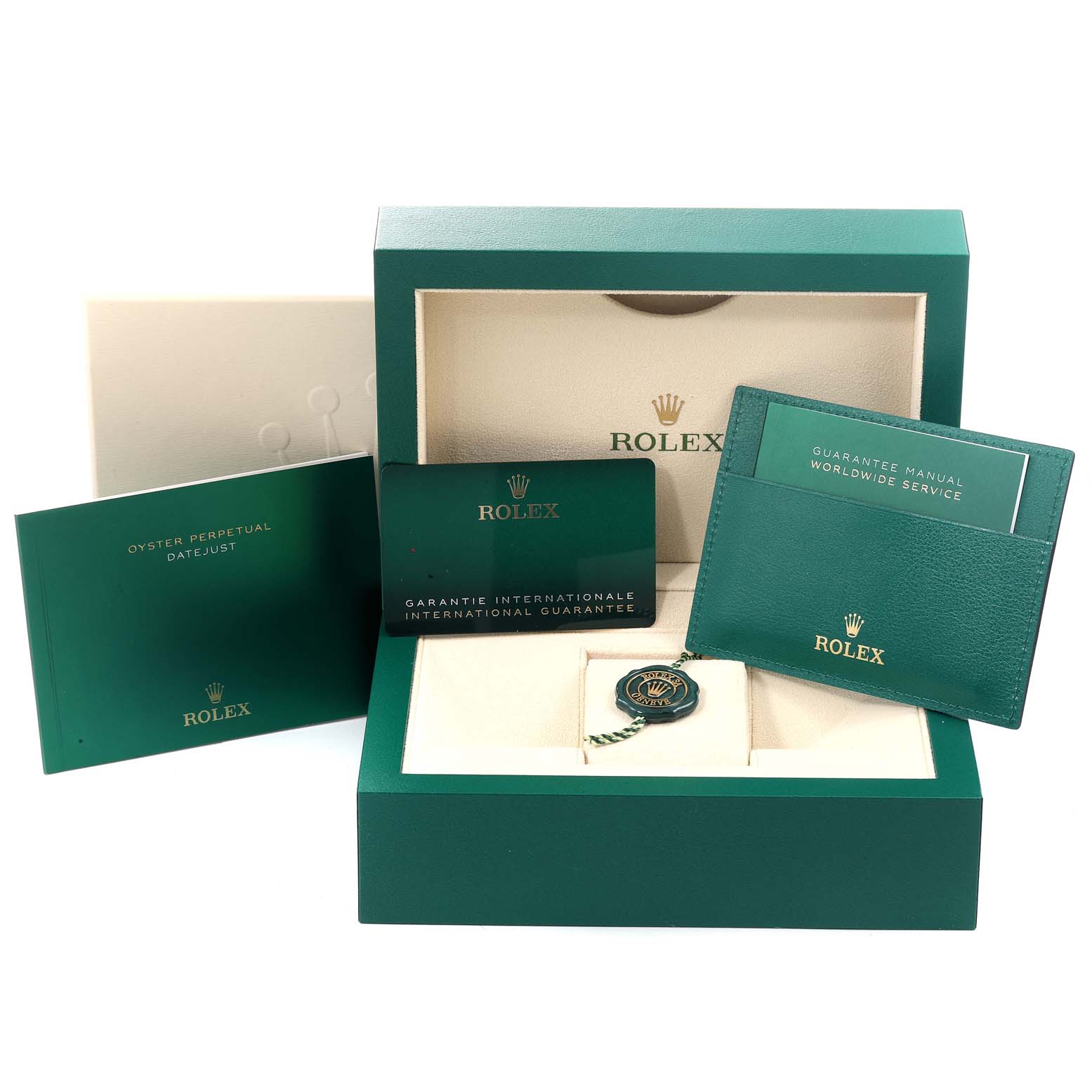 The image shows the packaging and accessories for a Rolex Datejust 126284 Men's Stainless Steel Blue Dial 126284 Men's Stainless Steel Blue Dial, including a box, manuals, and a guarantee card.