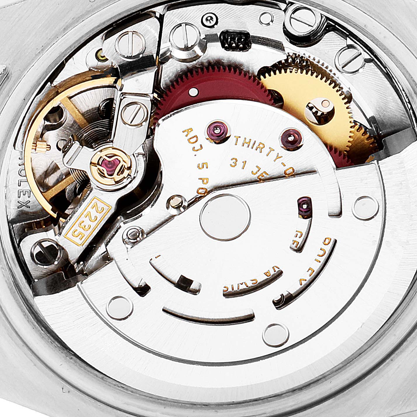 The image shows the inner mechanical movement of the Rolex Datejust 179174 Women's Stainless Steel Silver Dial 179174 Women's Stainless Steel Silver Dial watch, displaying gears, jewels, and oscillating weight.