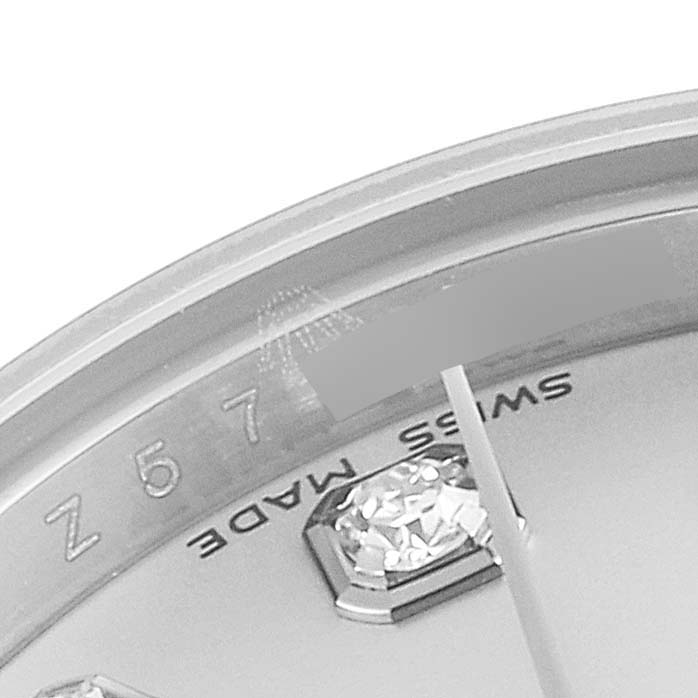 The image shows a close-up of the dial edge and a diamond hour marker on a Rolex Datejust 179174 Women's Stainless Steel Silver Dial 179174 Women's Stainless Steel Silver Dial watch.