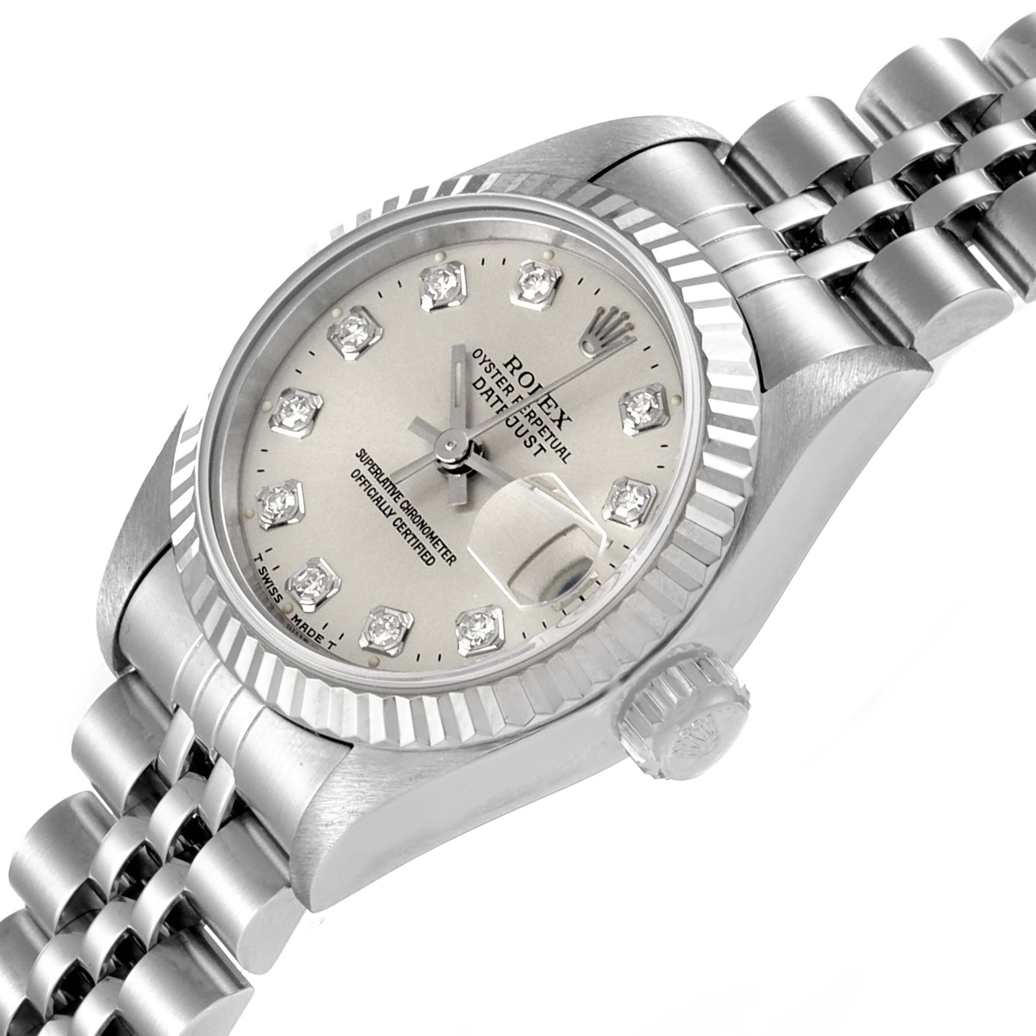 This image shows a close-up of the Rolex Datejust 69174 Women
s Stainless Steel Silver Dial 69174 Women
s Stainless Steel Silver Dial watch from an angled perspective, featuring the dial, bezel, and part of the bracelet.