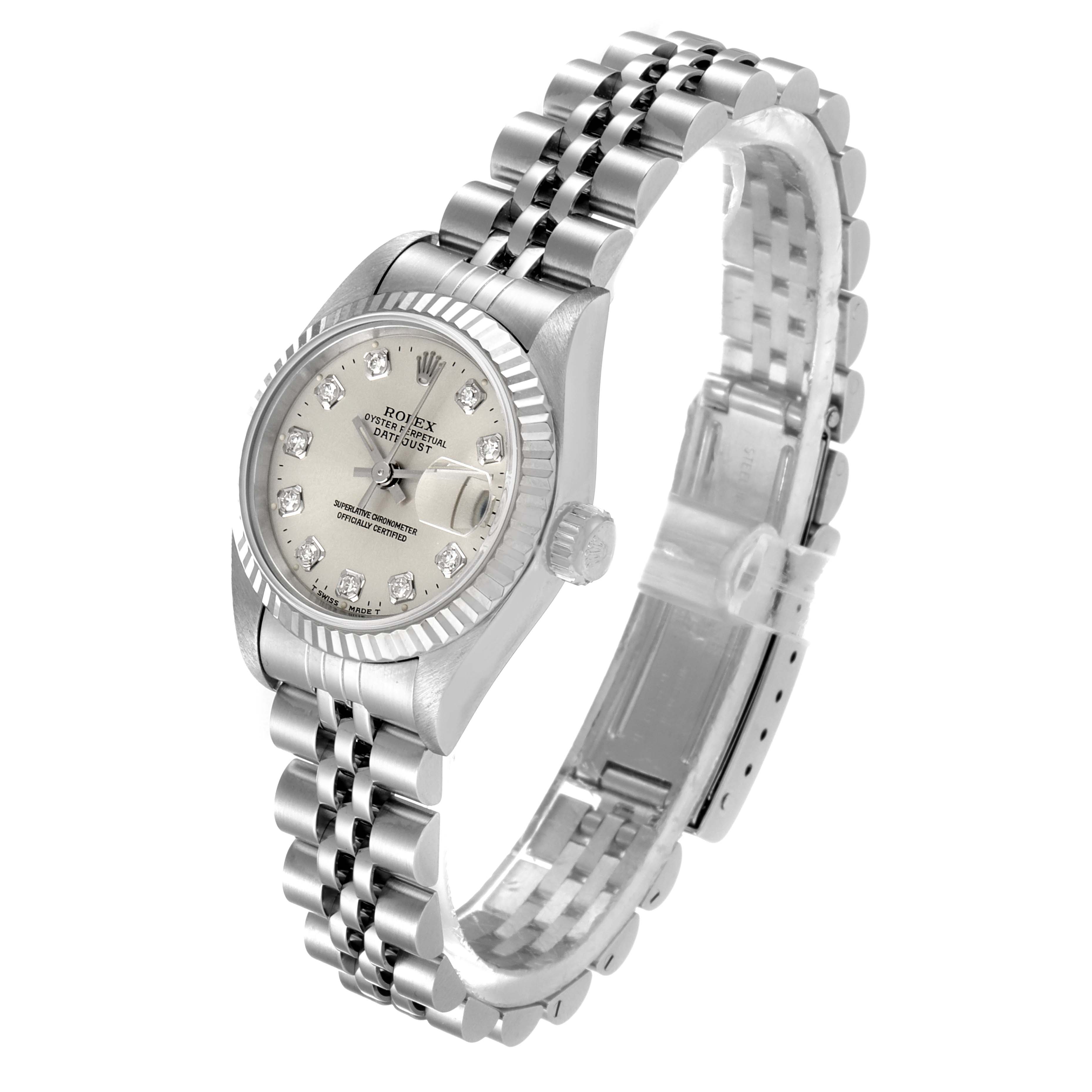 The Rolex Datejust 69174 Women
s Stainless Steel Silver Dial 69174 Women
s Stainless Steel Silver Dial watch is shown at an angle highlighting the dial, bezel, and bracelet with a clear view of the clasp.