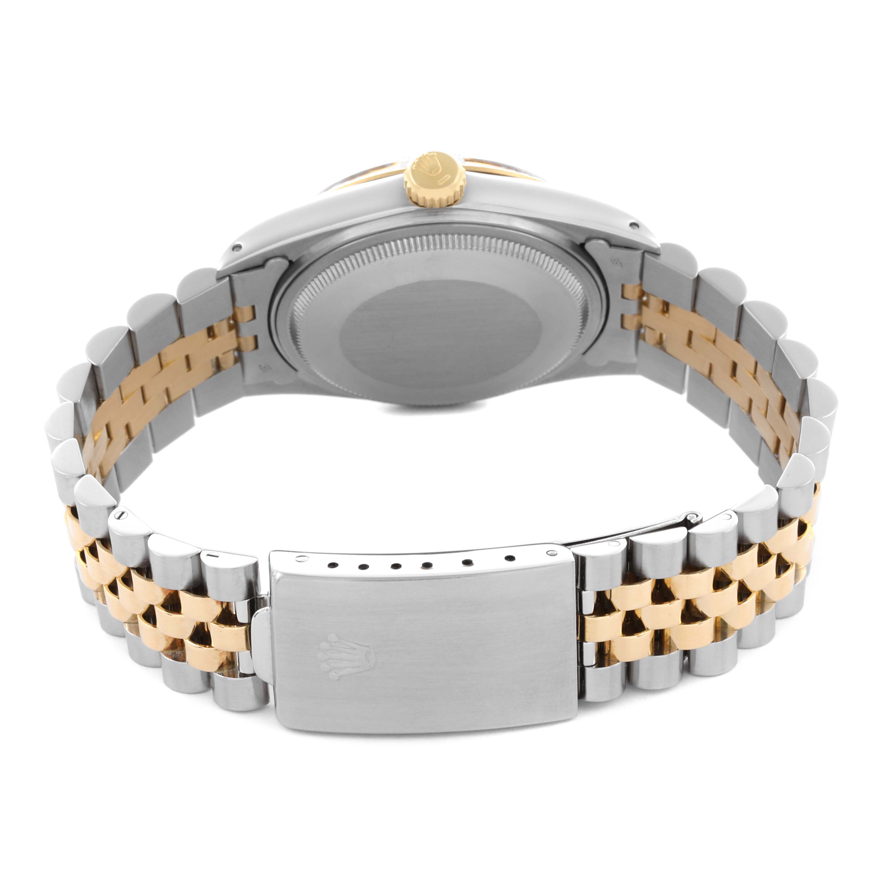 The image shows the back view of the Rolex Datejust 16013 Men's Steel and Gold (two tone) Champagne Dial 16013 Men's Steel and Gold (two tone) Champagne Dial watch, highlighting the two-tone Jubilee bracelet and clasp.